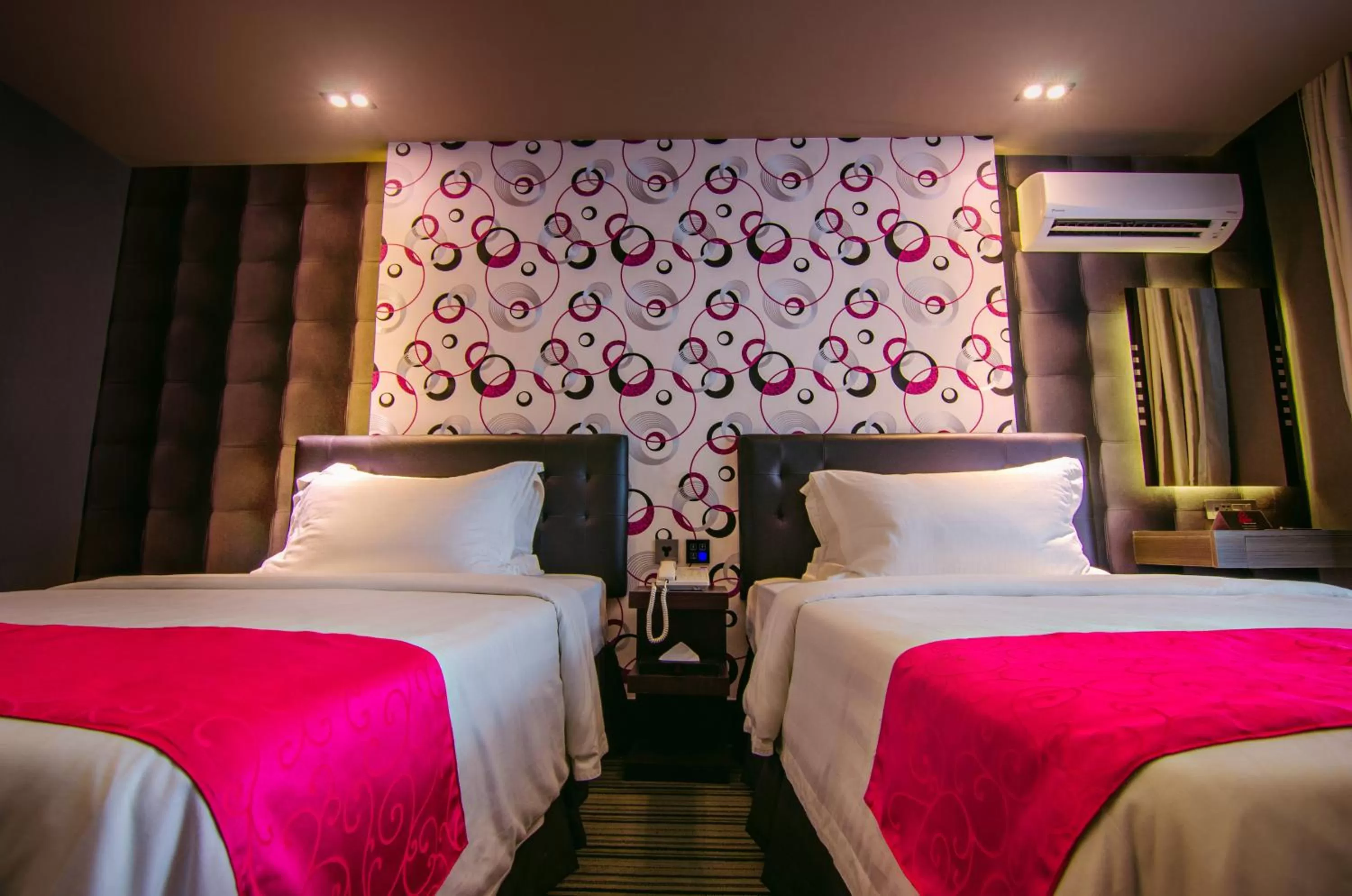 Bed in Eloisa Royal Suites