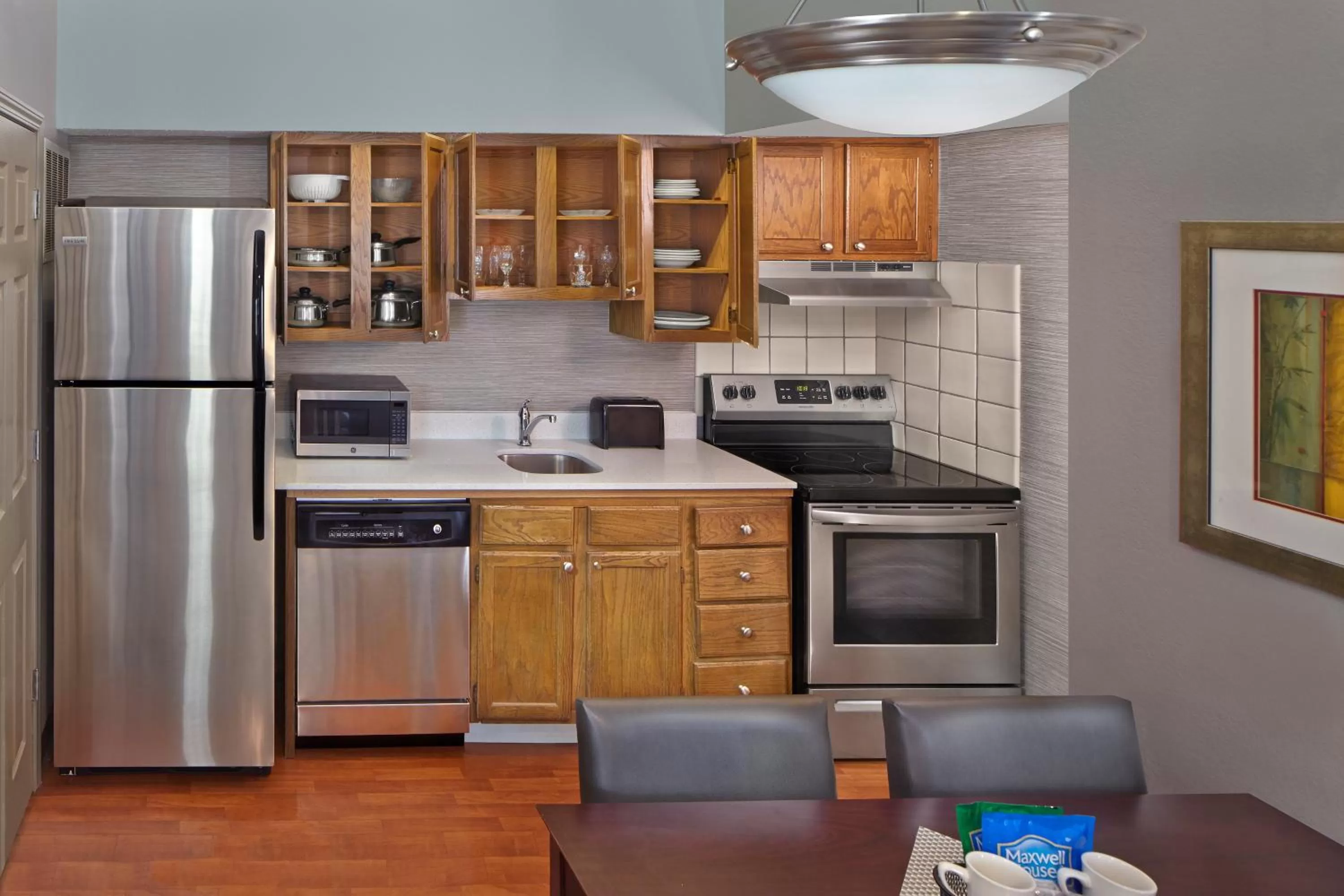 Kitchen or kitchenette in New Haven Village Suites
