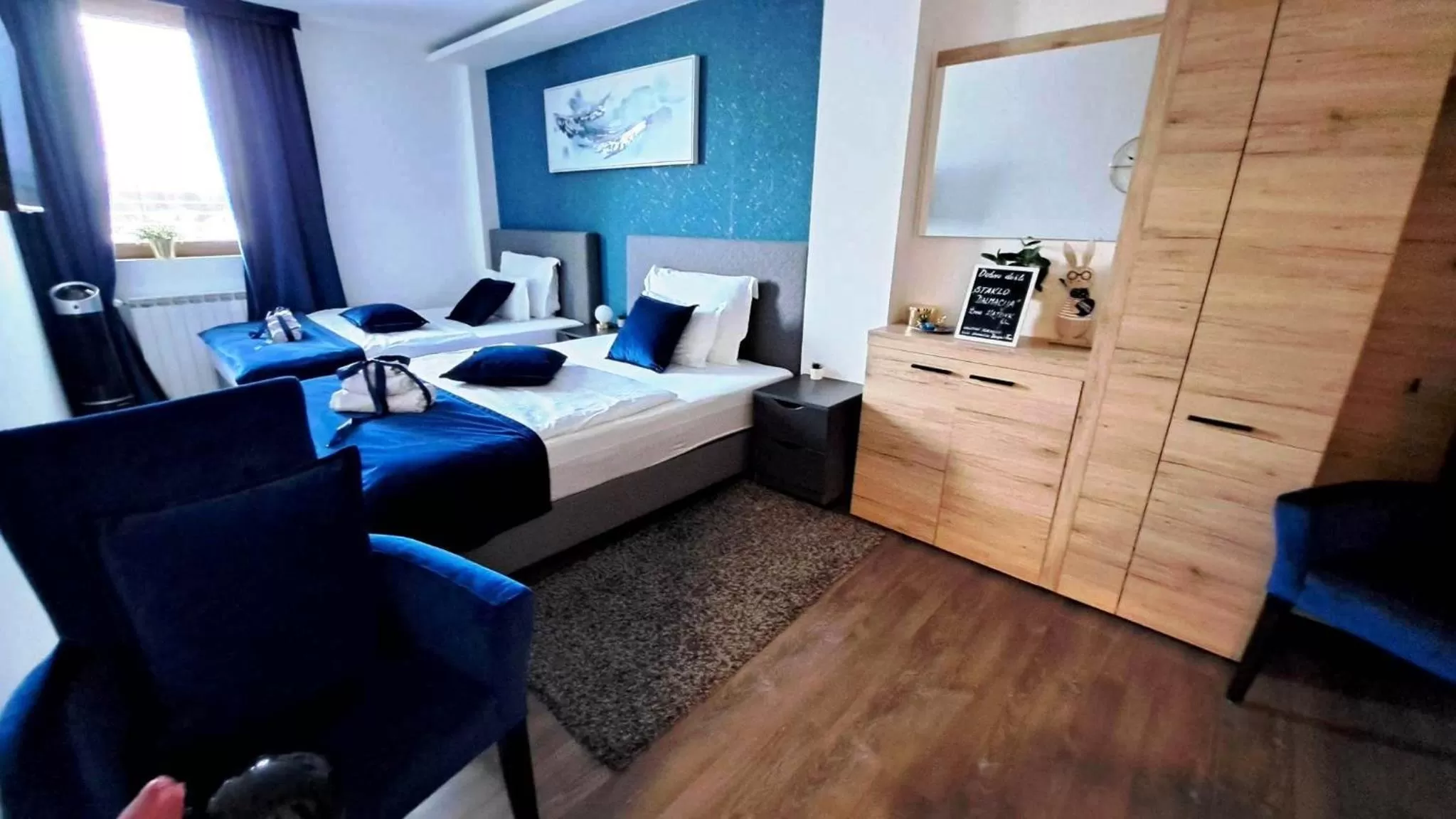 Bed in Arcobaleno Apartments & Rooms