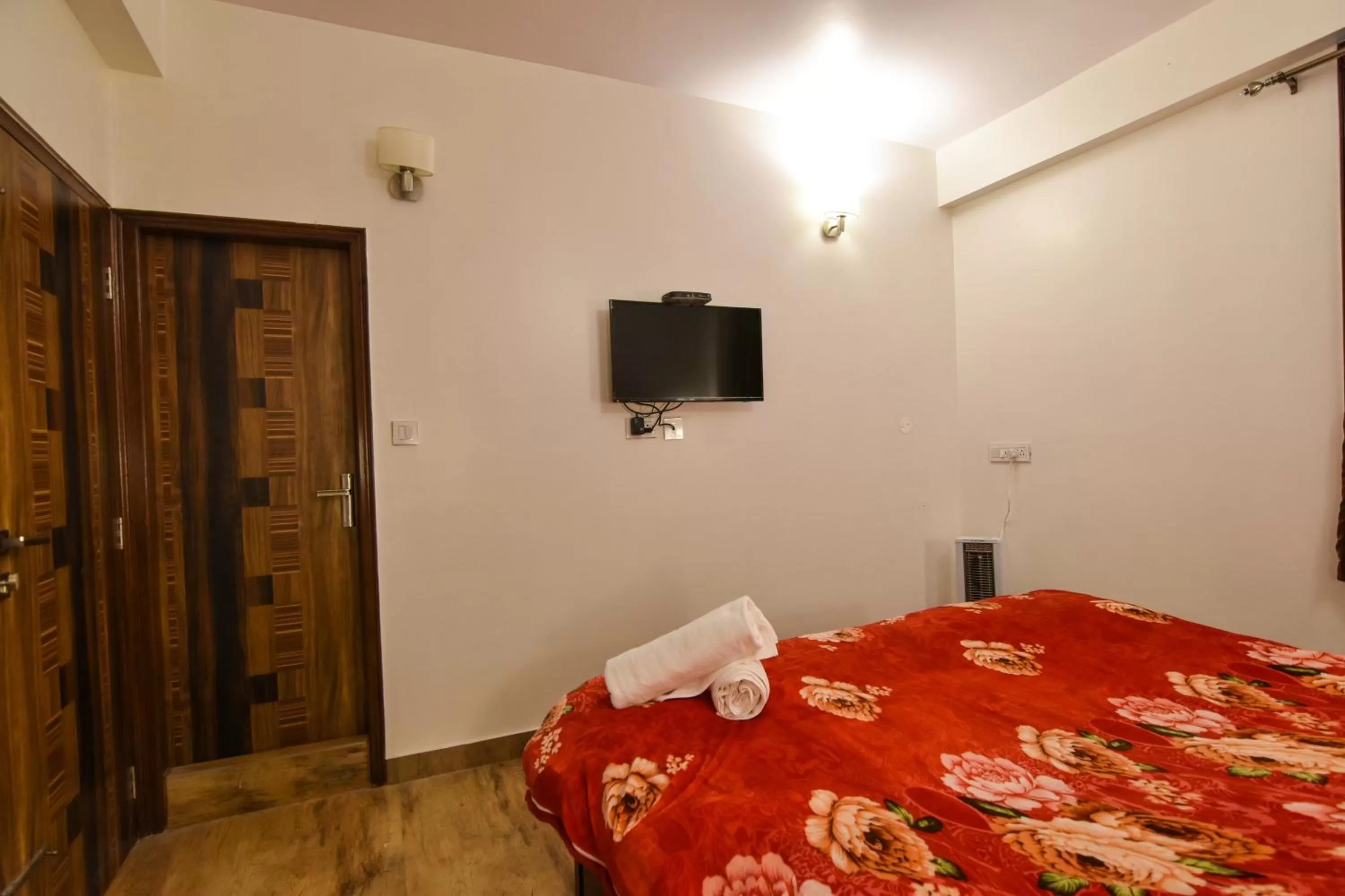 Bedroom, Bed in Dhanlaxmi Apartments