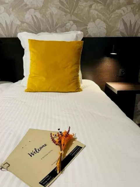 Bed in Bloomhotel