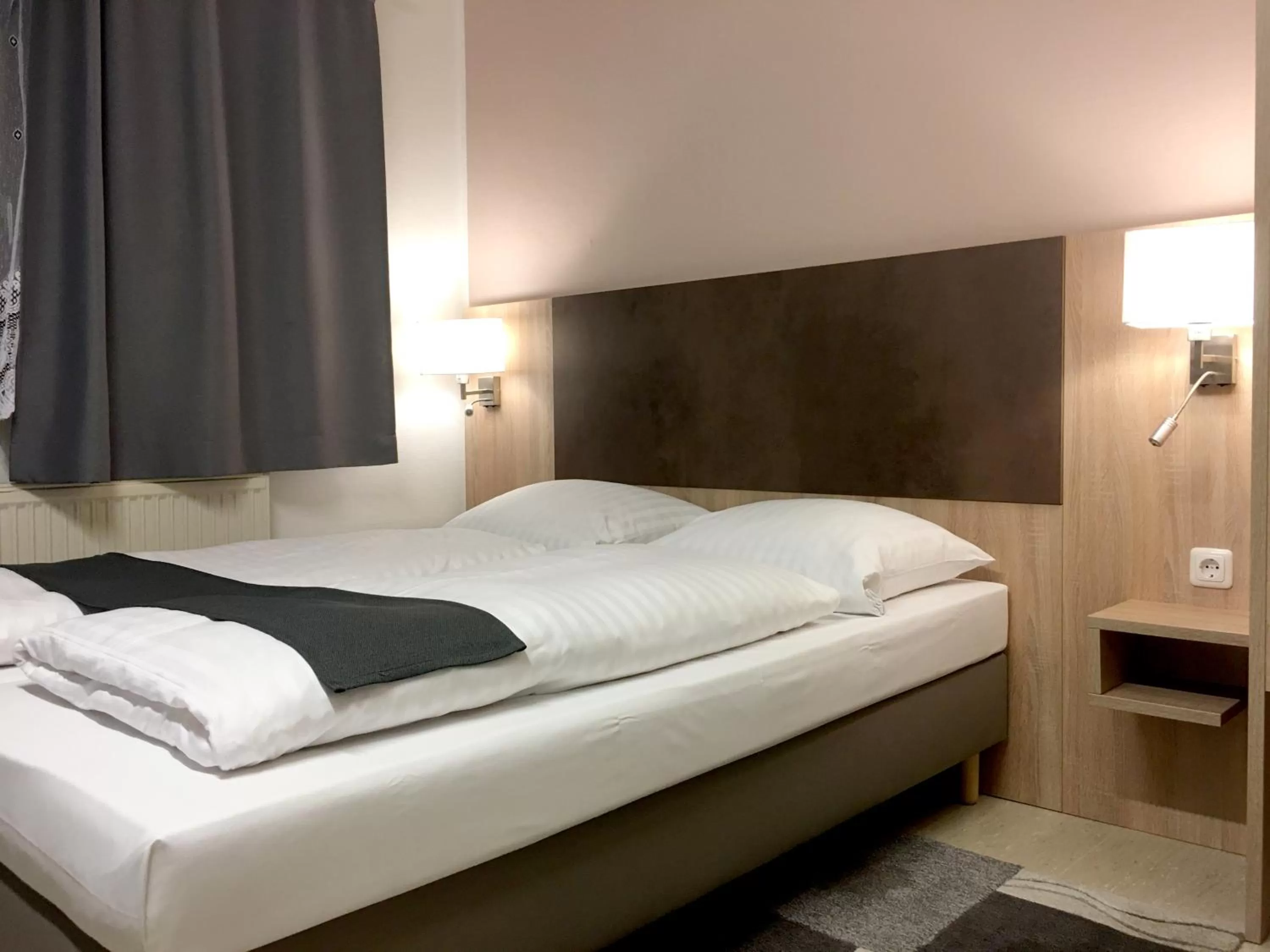 Bed in Hana Aparthotel