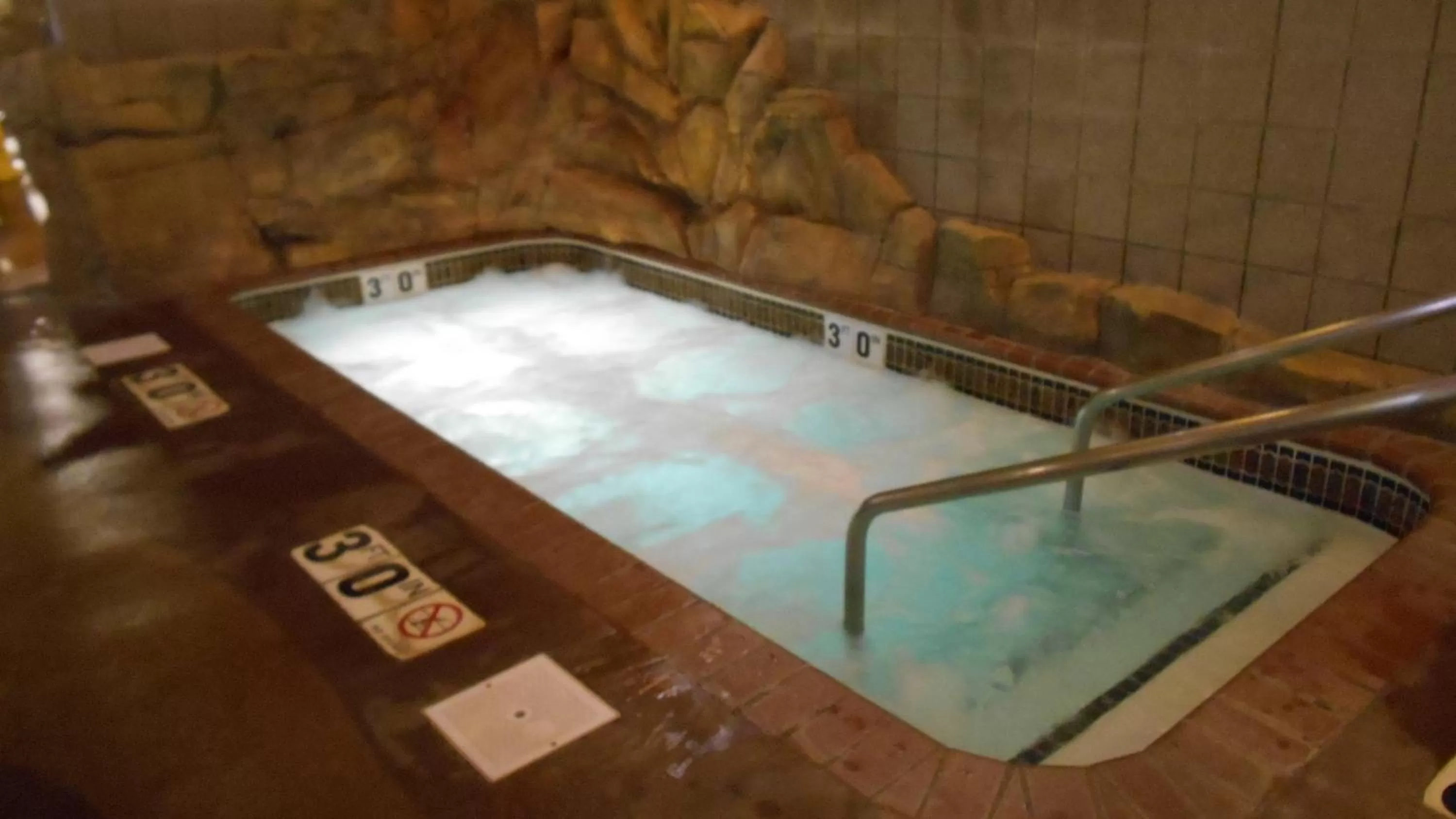 Swimming pool in AmericInn by Wyndham Chippewa Falls