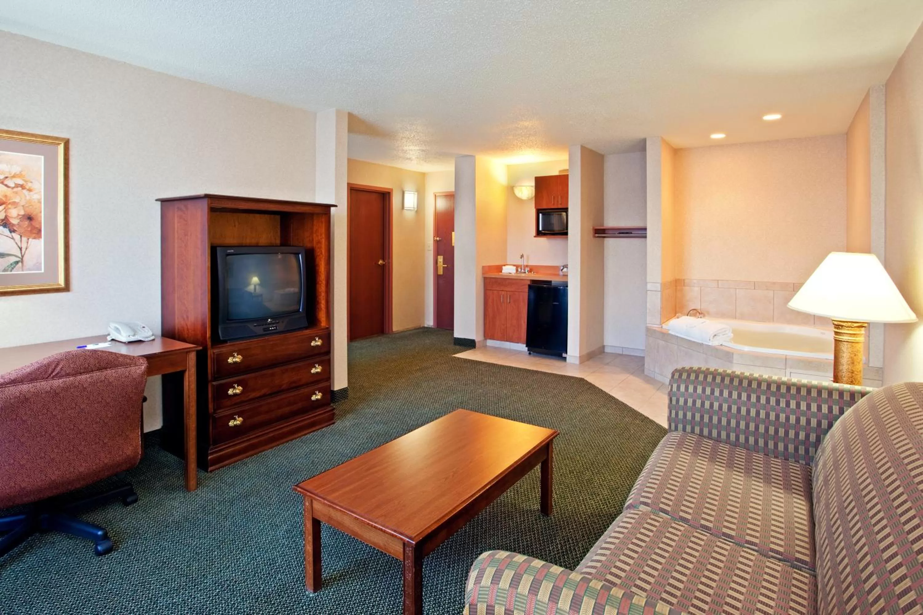 Living room in Holiday Inn Express and Suites Pittsburgh West Mifflin by IHG