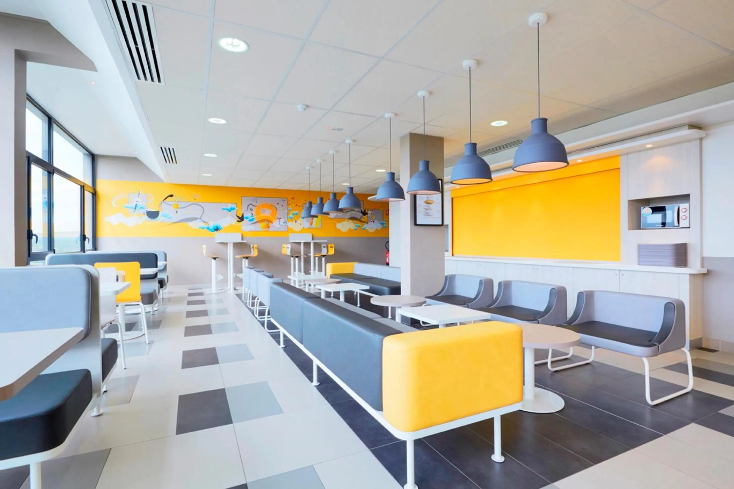 Communal lounge/ TV room in Première Classe Thionville