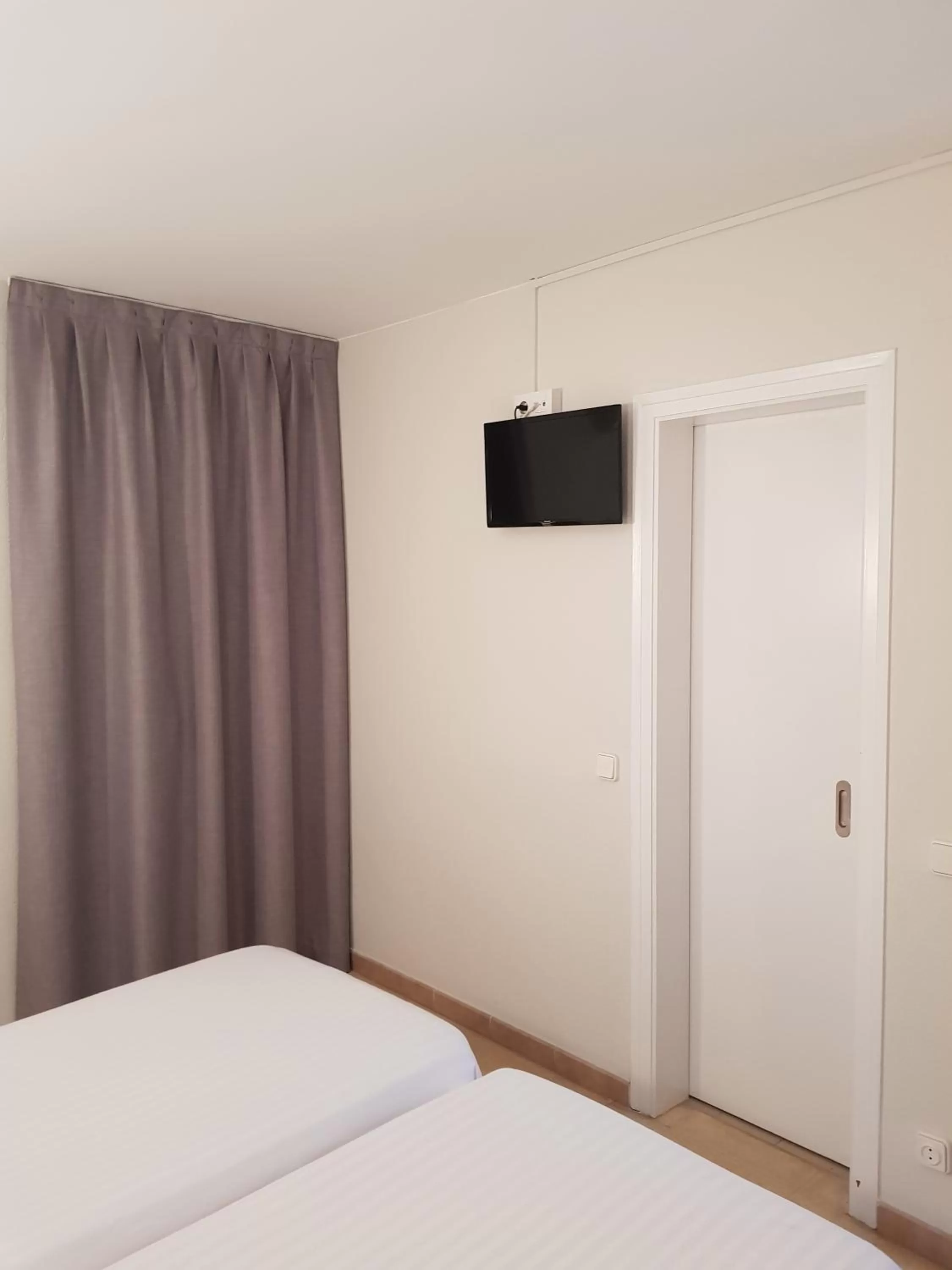 Bed in Hostal Ondina