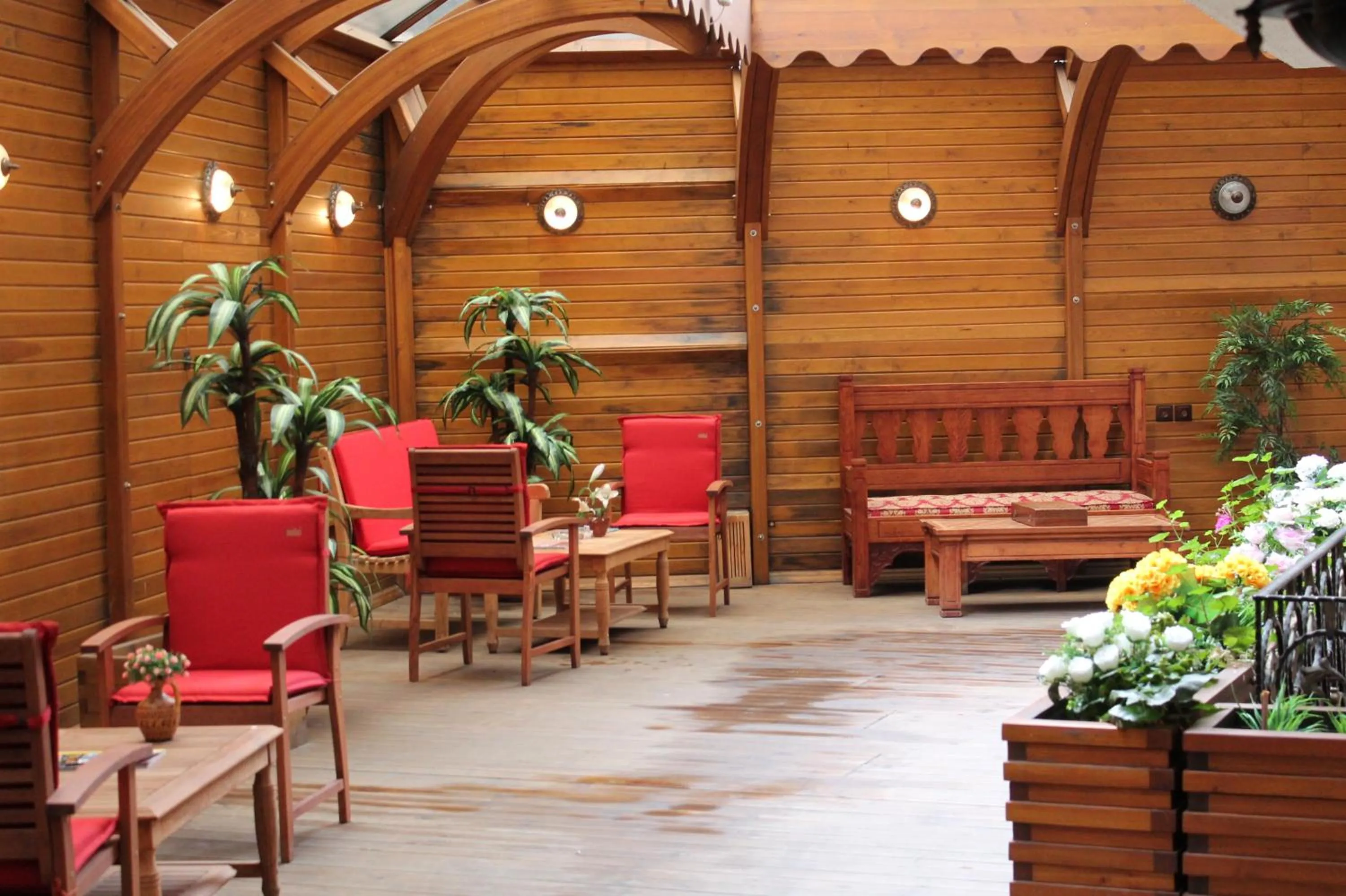 Communal lounge/ TV room in Aruna Boutique Hotel