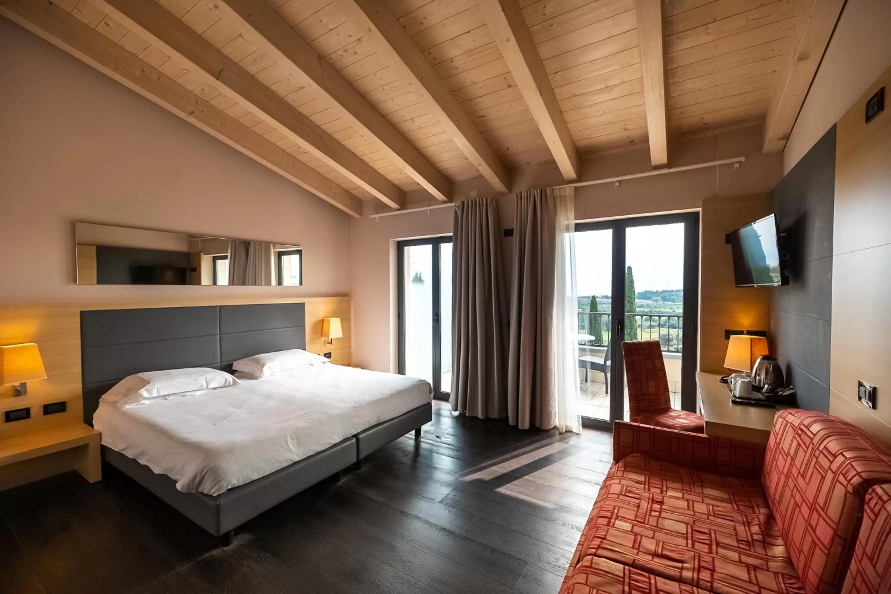 Bed in Villa Luisa Resort & Luxury Apartments