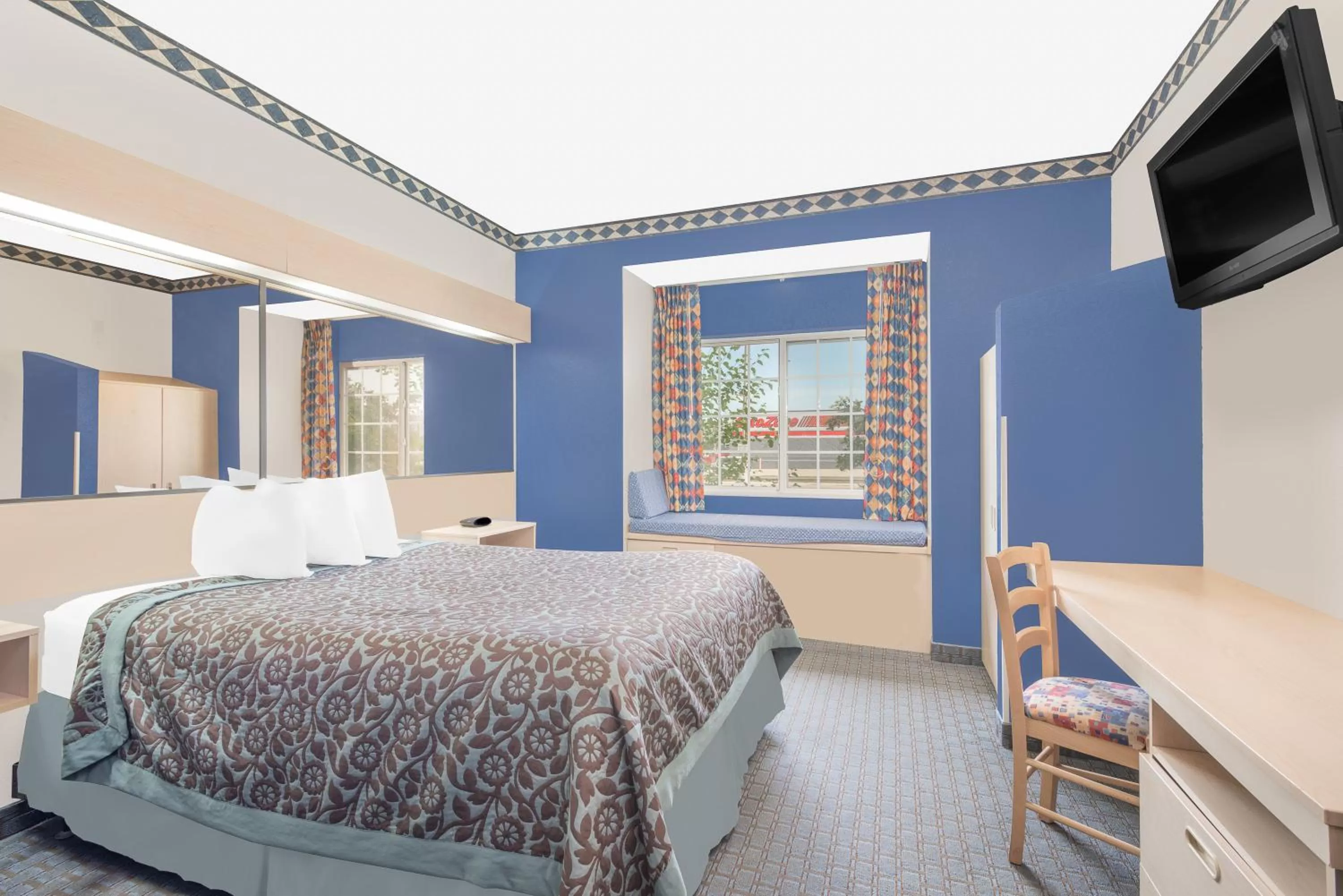 Bedroom, Bed in Days Inn & Suites by Wyndham Hutchinson