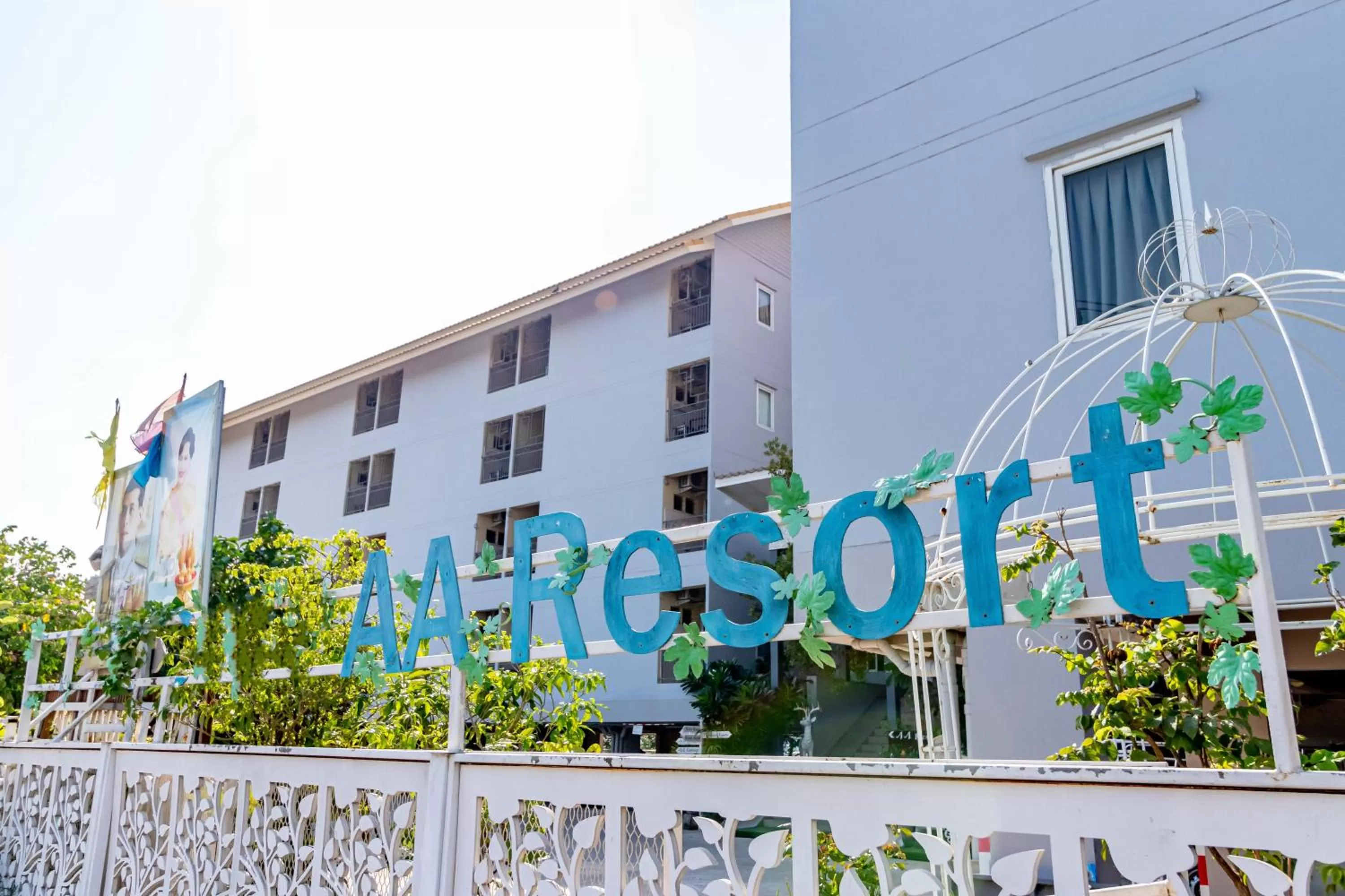 Property logo or sign in AA Resort Hotel