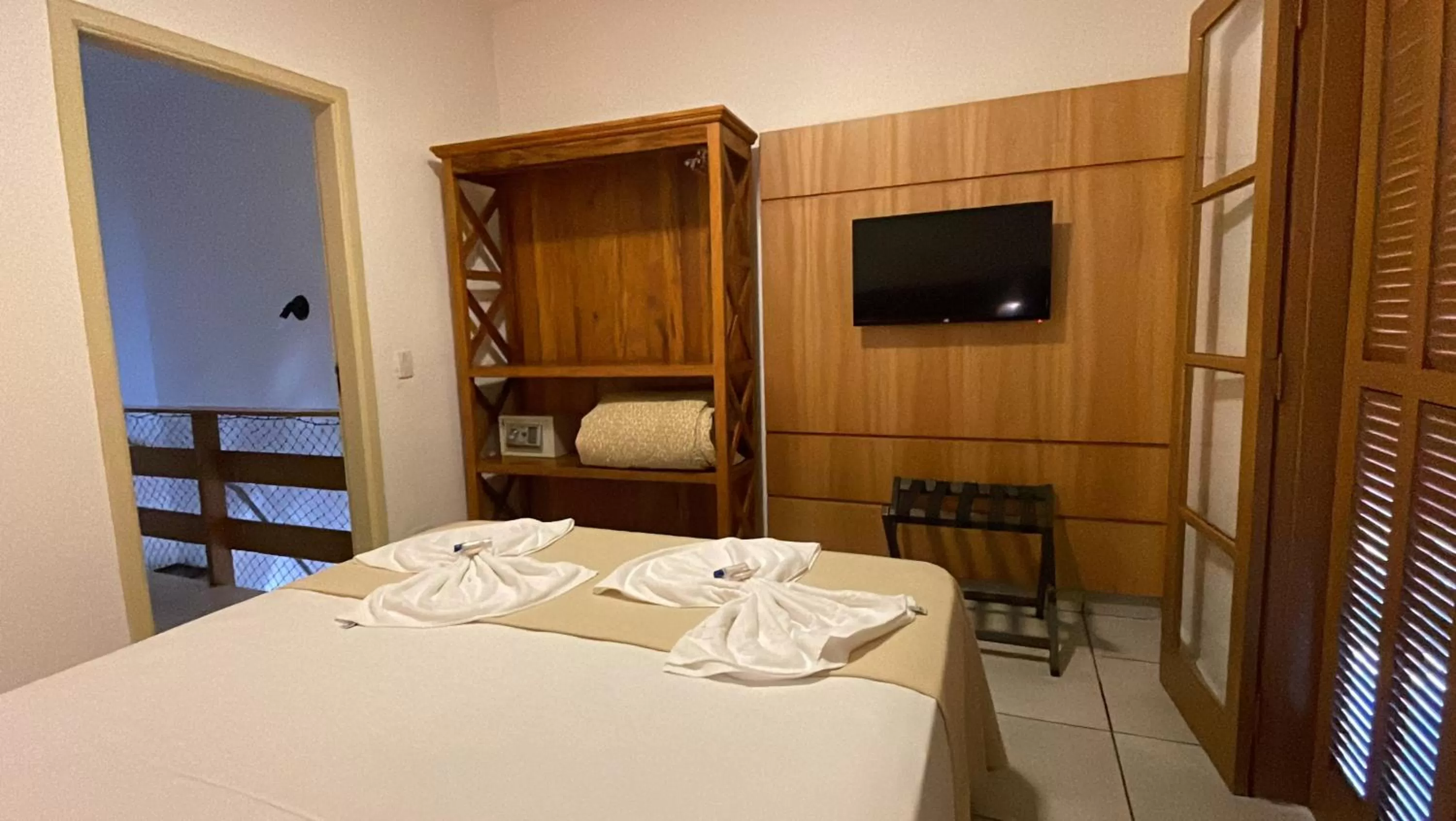 Bed in Pousada Ilha Vitoria