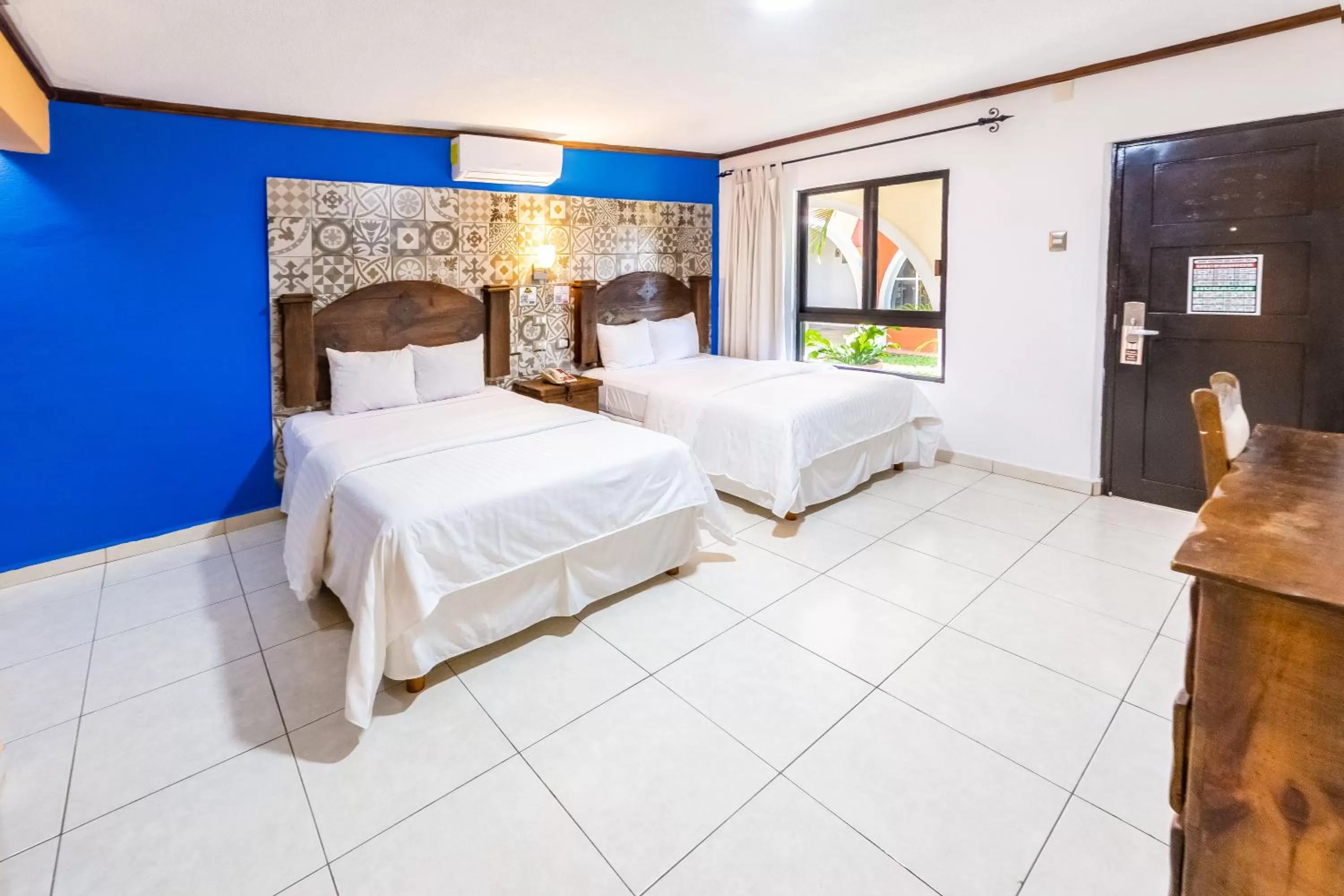 Bedroom, Bed in Hacienda Inn Aeropuerto