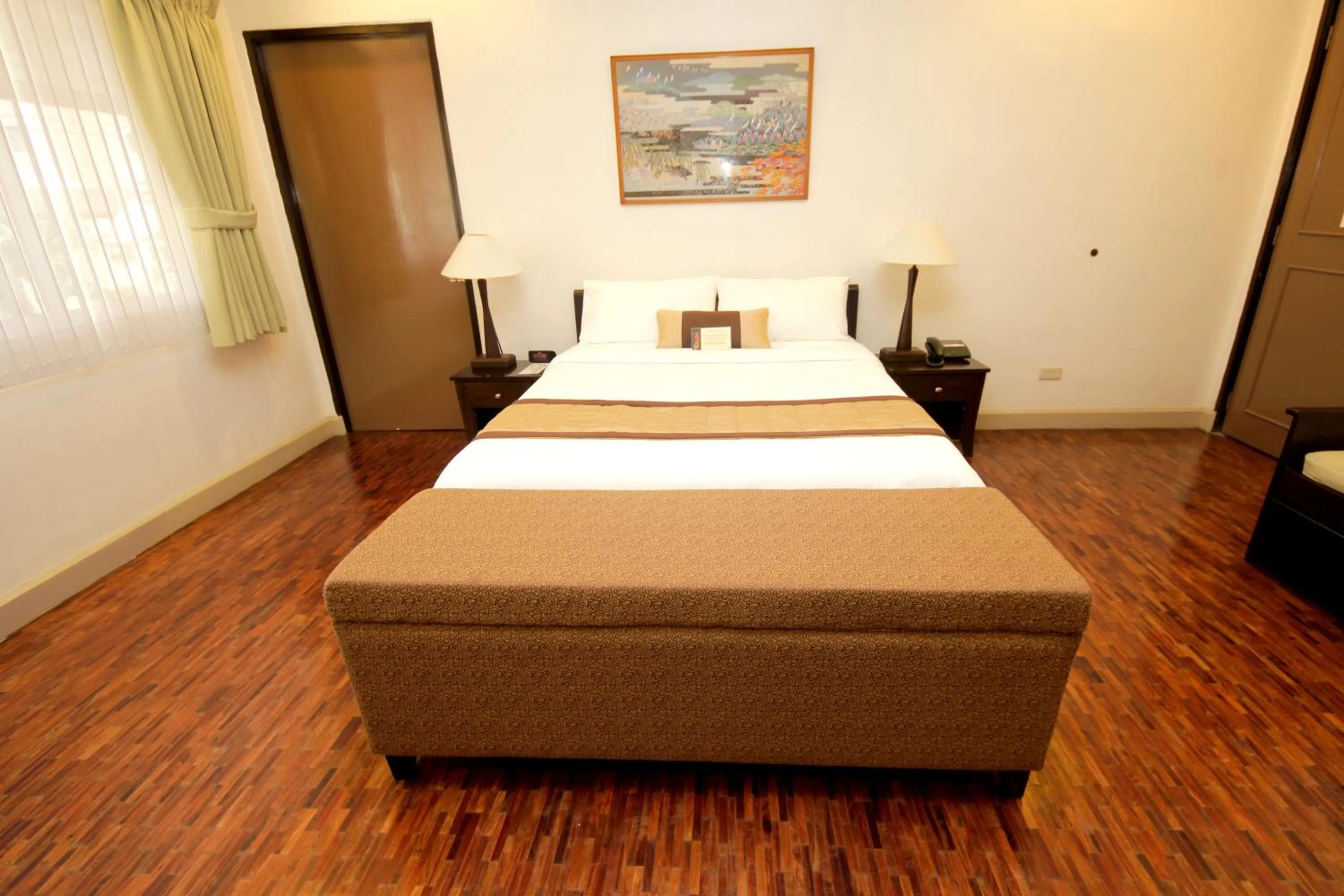 Living room, Bed in Casa Pura Inn and Suites