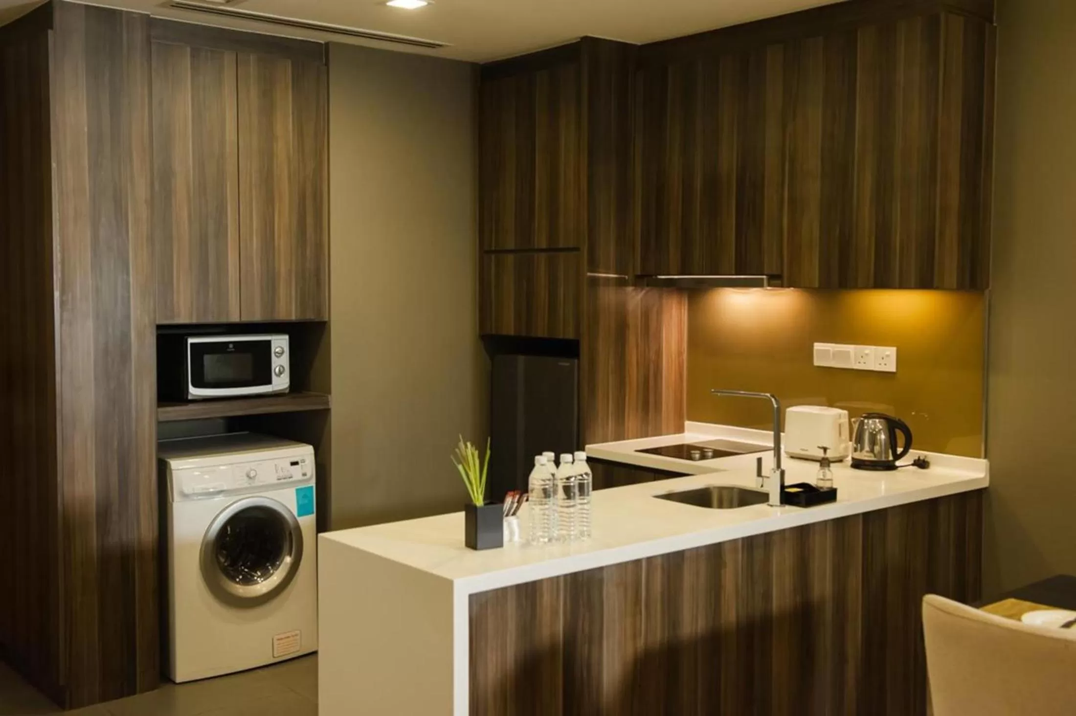 Kitchen or kitchenette in Ramada Suites by Wyndham Kuala Lumpur City Centre