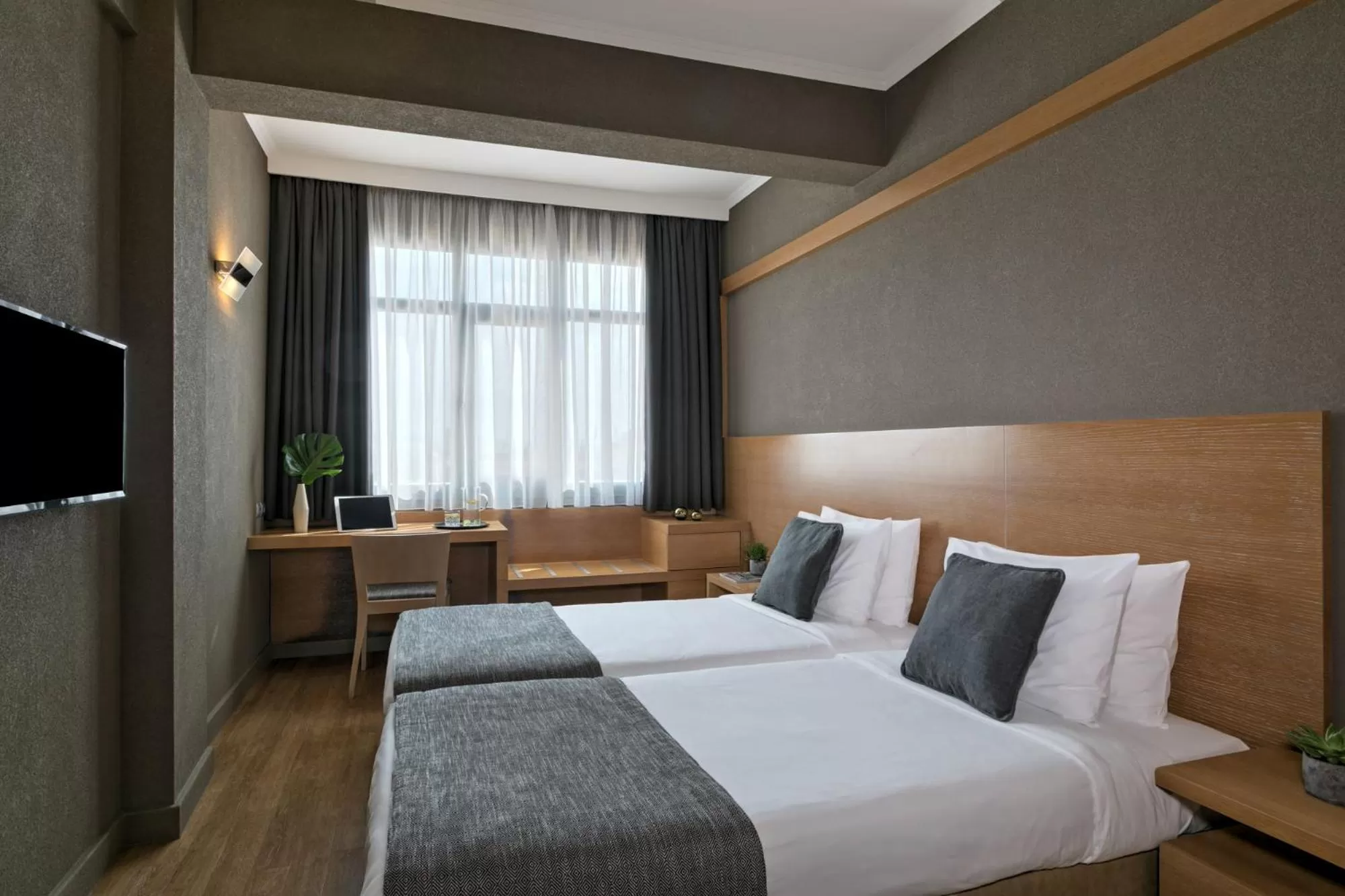 Bed in Porto Palace Hotel Thessaloniki