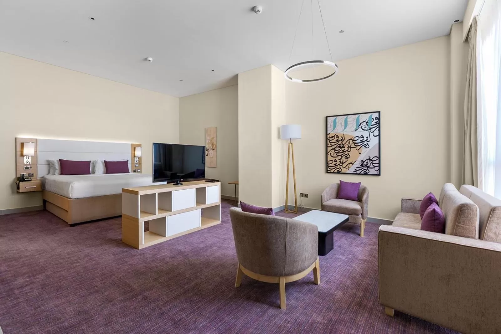 Seating area, Bed in Premier Inn Dubai Ibn Battuta Mall