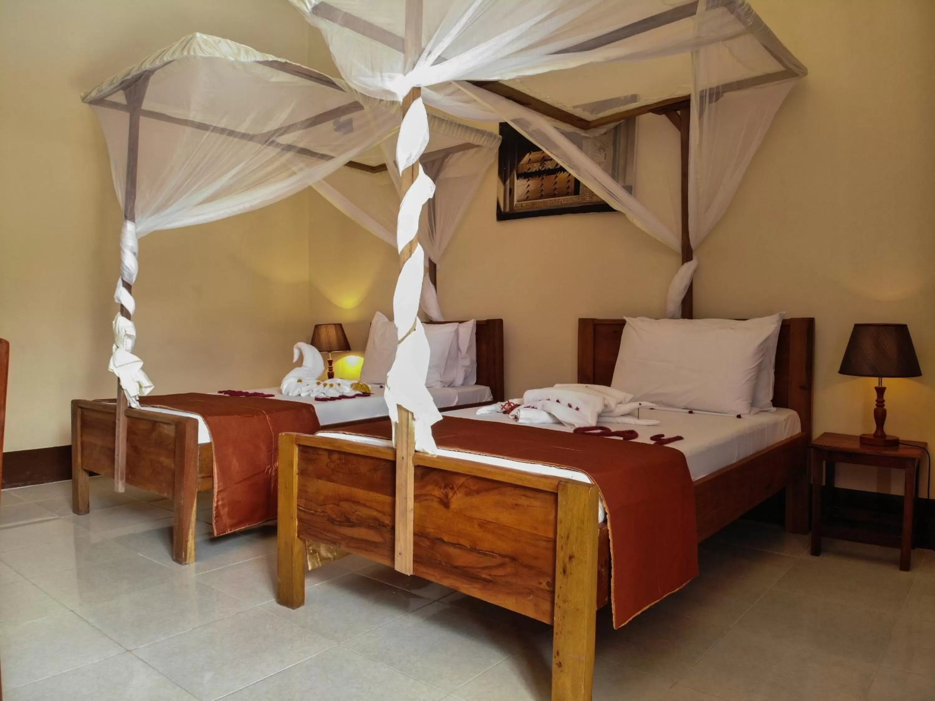Bed in Amaan Beach Bungalows