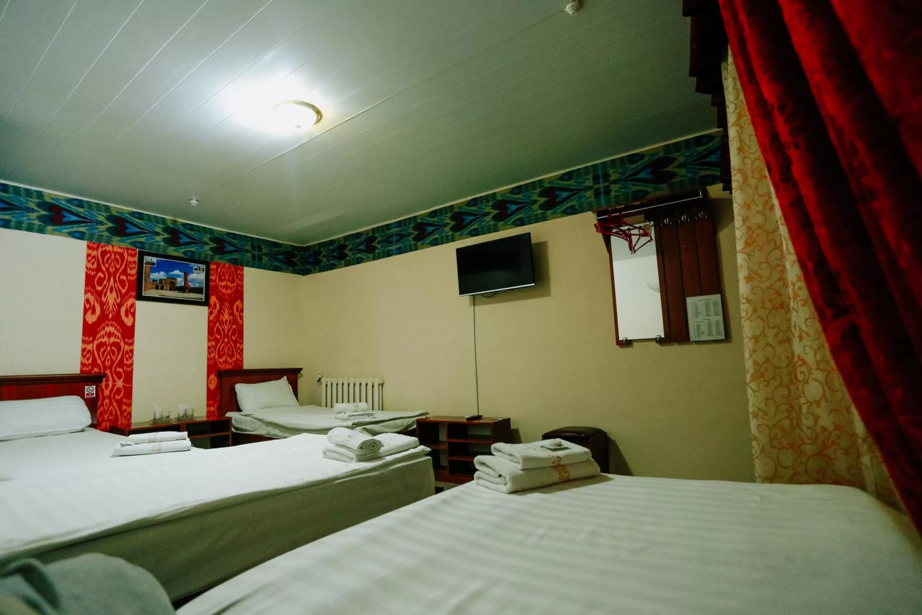 Bed in BUKHARA HOUSE hotel