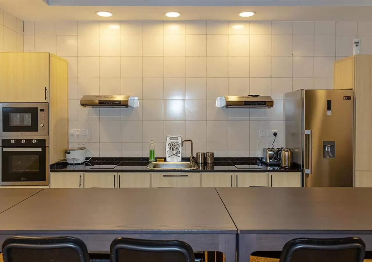 Kitchen or kitchenette, Kitchen/Kitchenette in KSK Homes Hotel Dubai Academic City