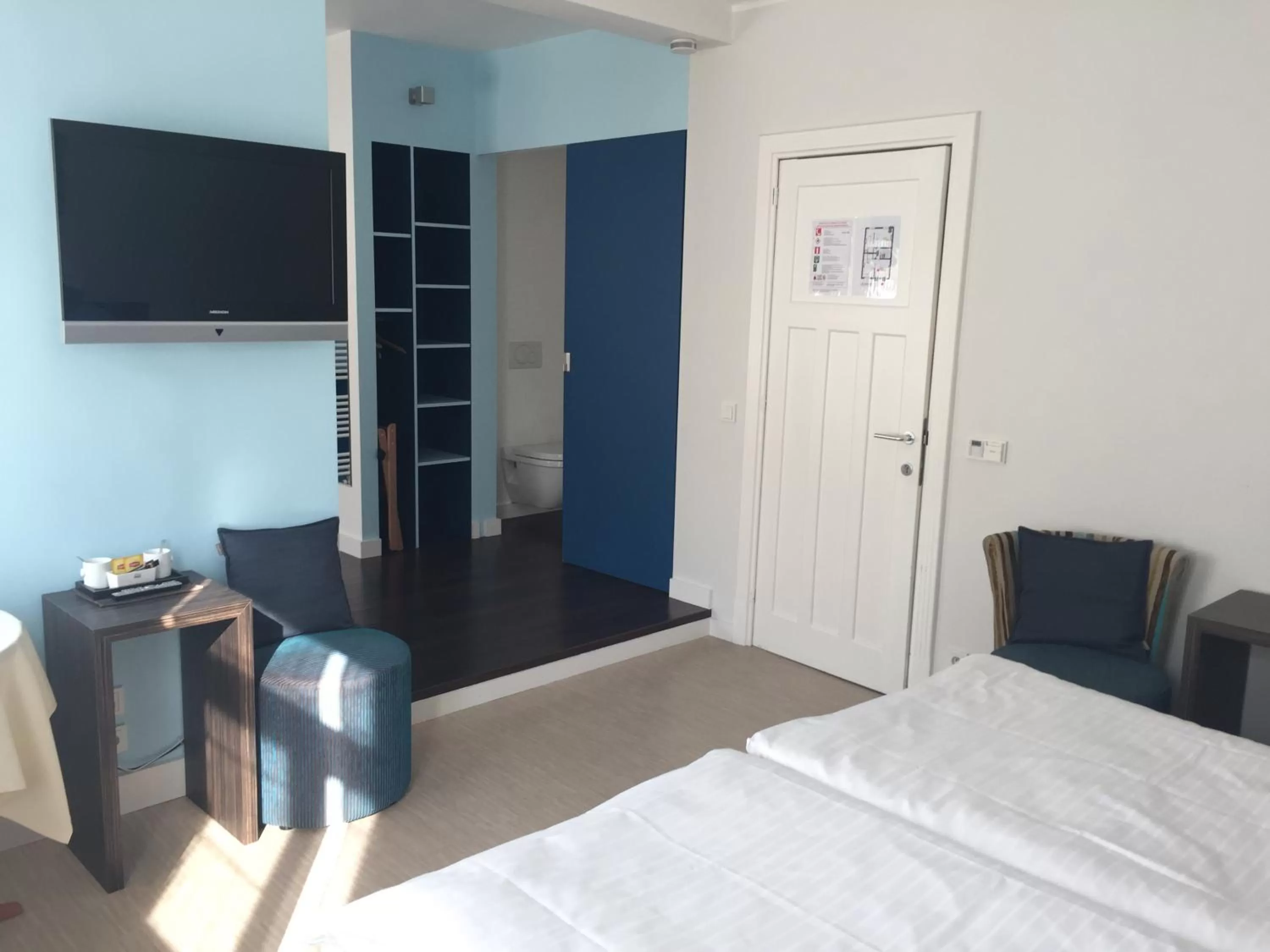 Photo of the whole room, TV/Entertainment Center in B&B Sabbajon