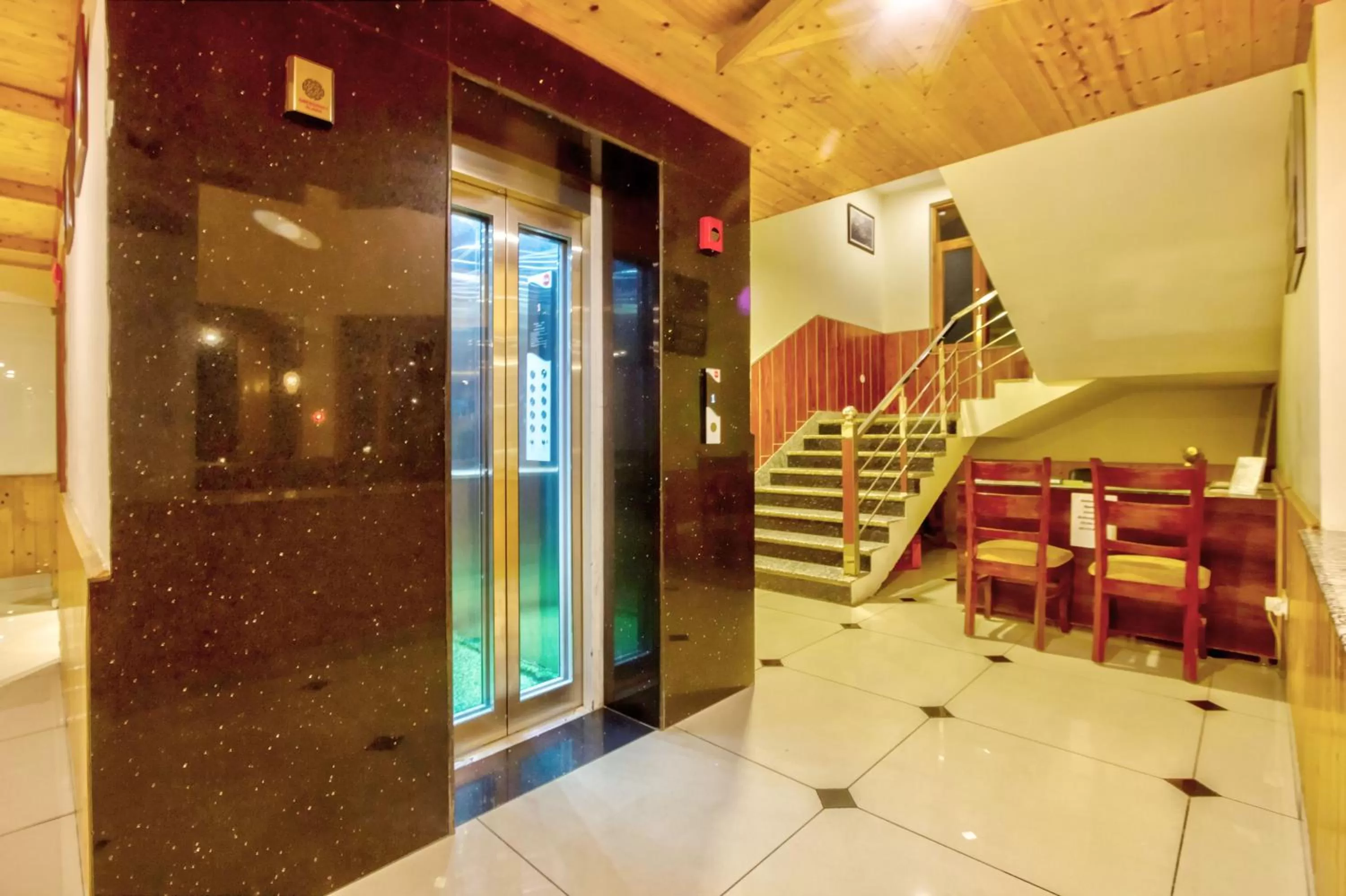 Seating area in Snow City's Montana Blues Resort Manali - Heated & Air-Cooled Stay