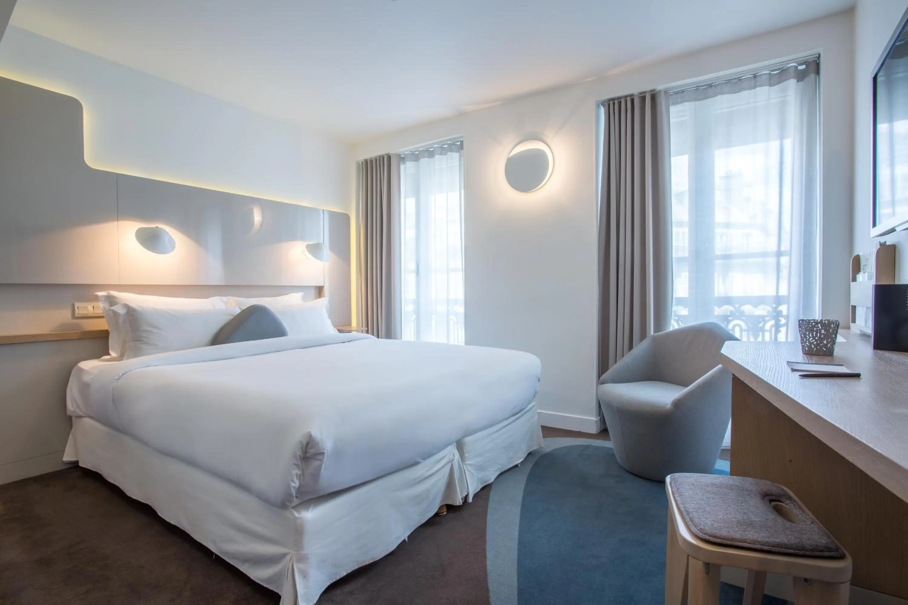 Bed in Hôtel Le Marcel Paris Gare de l'Est