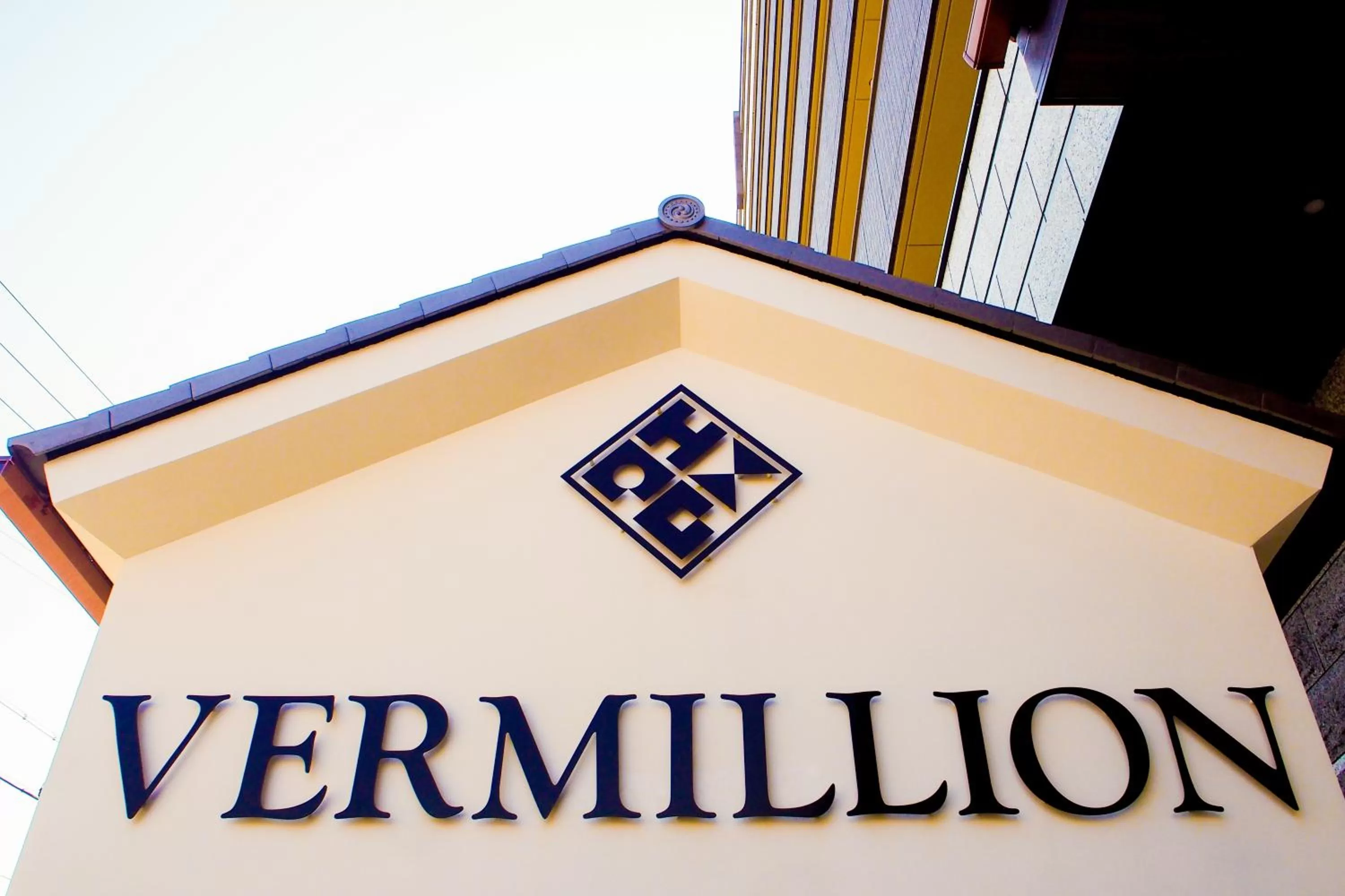 Property logo or sign in Ostay Vermillion Namba