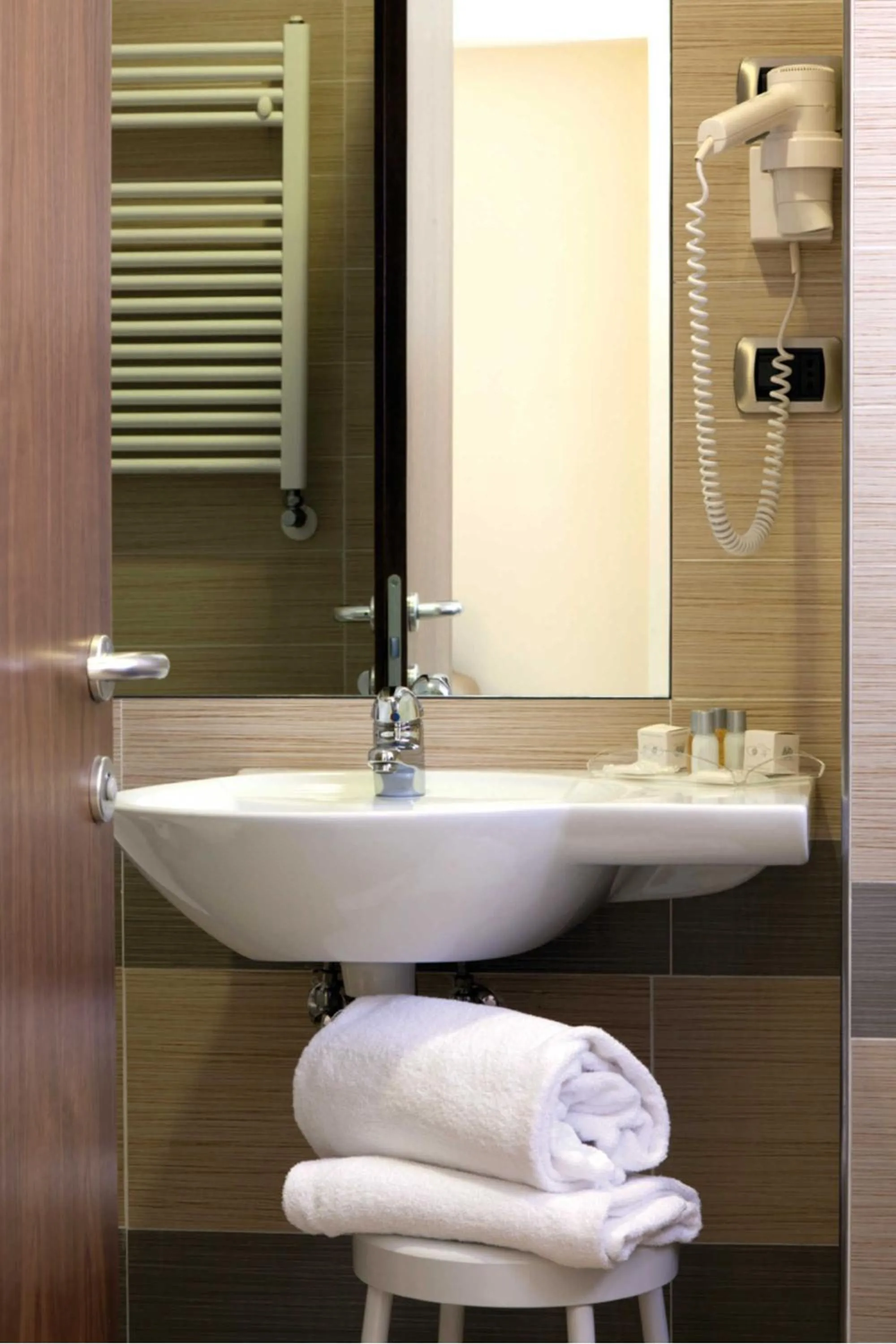 Bathroom in Suites & Residence Hotel