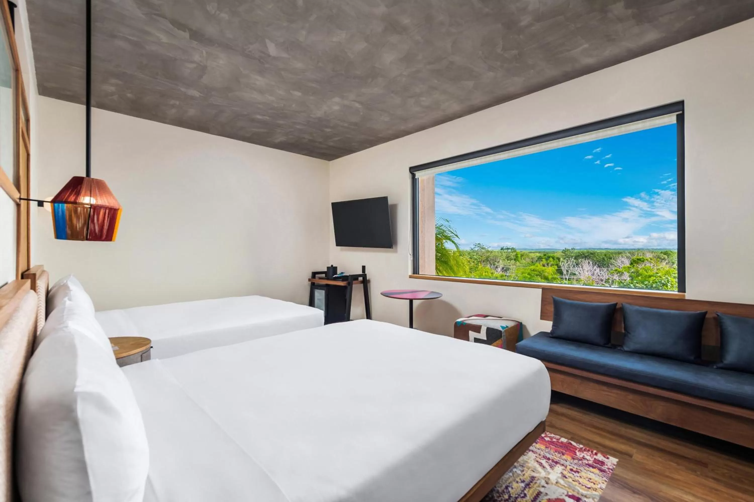 Photo of the whole room, Bed in Aloft Tulum