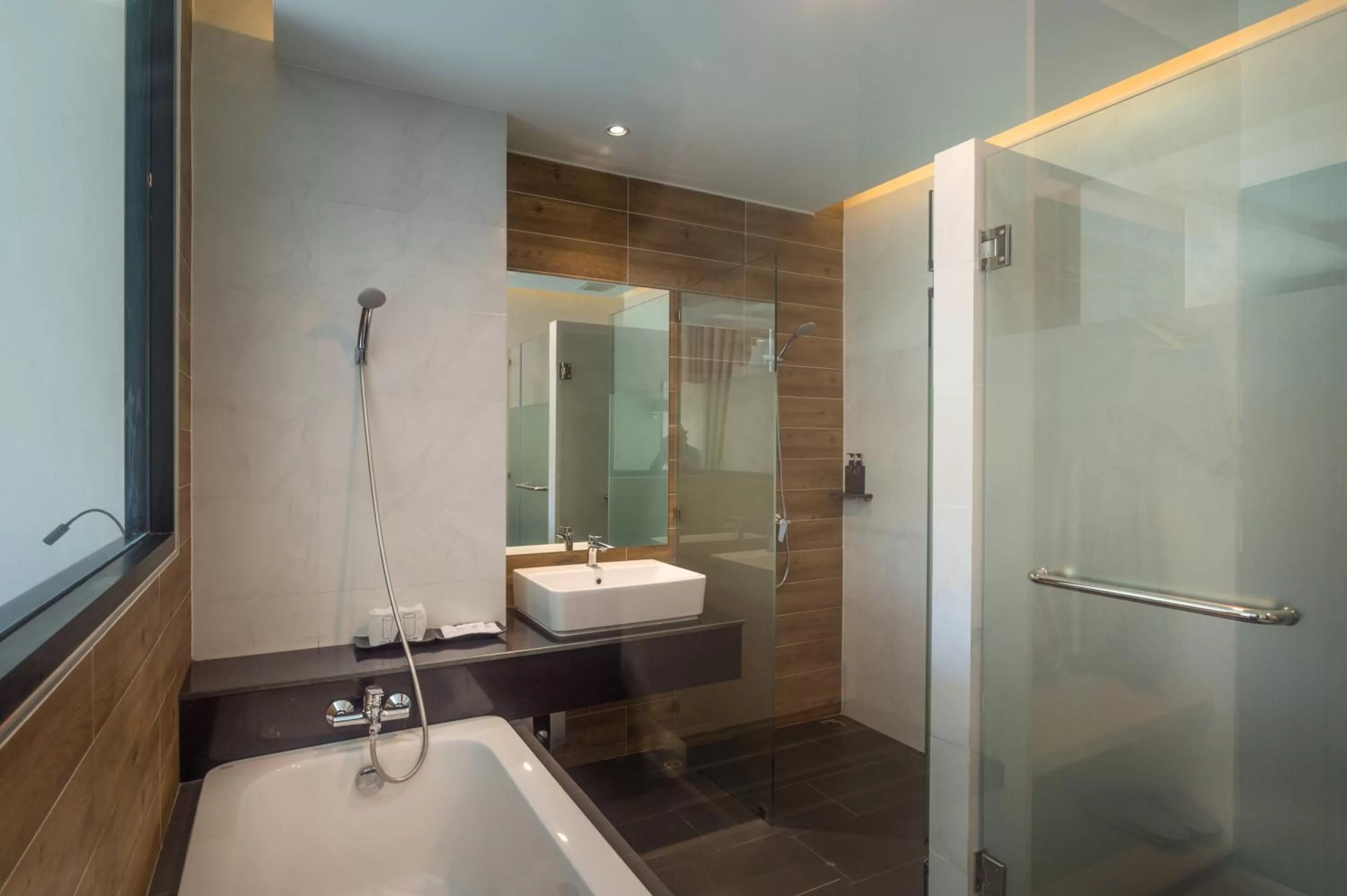 Shower in Cher​mantra​ Aonang​ Resort & Pool​ Suite