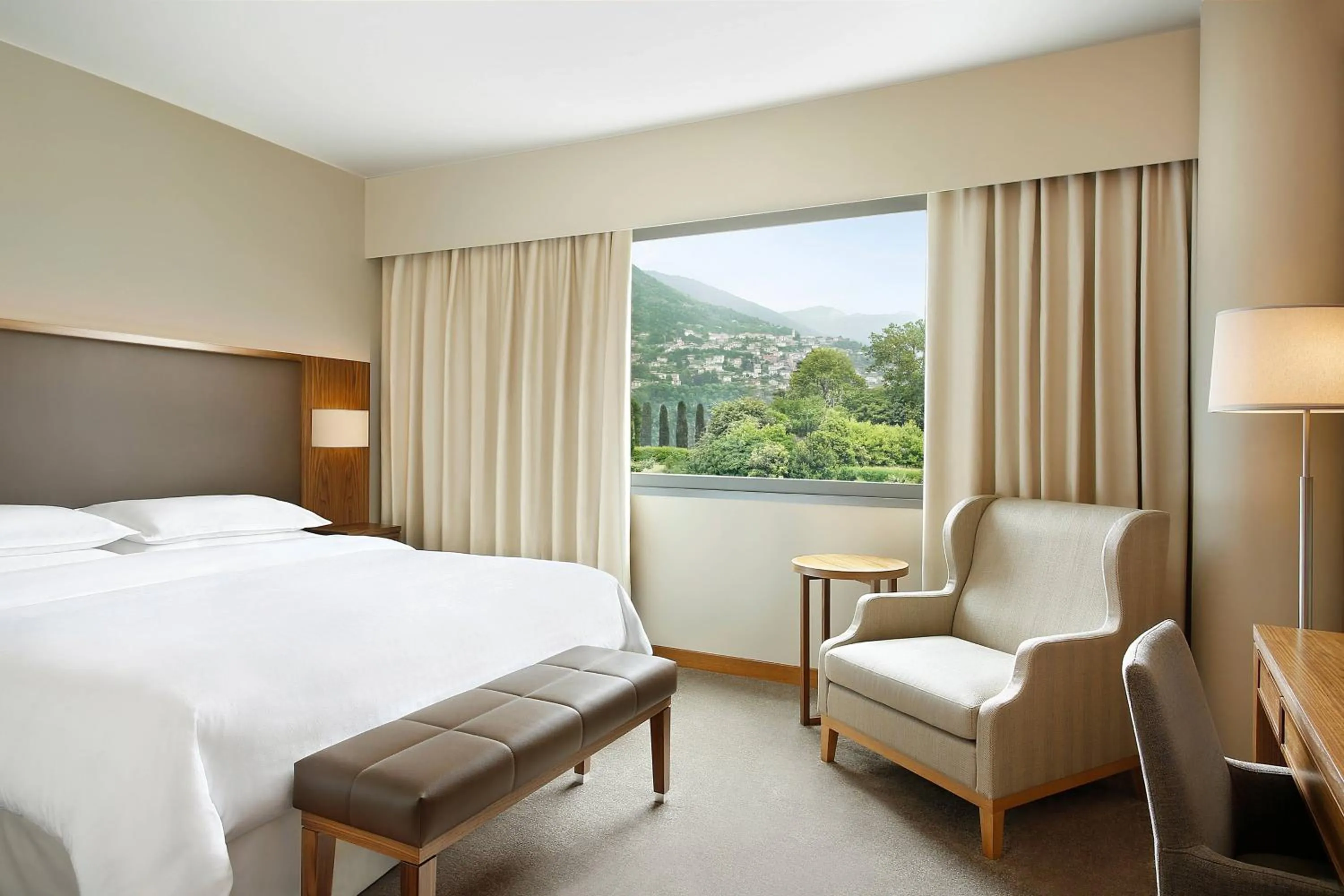 Photo of the whole room, Bed in Sheraton Lake Como Hotel
