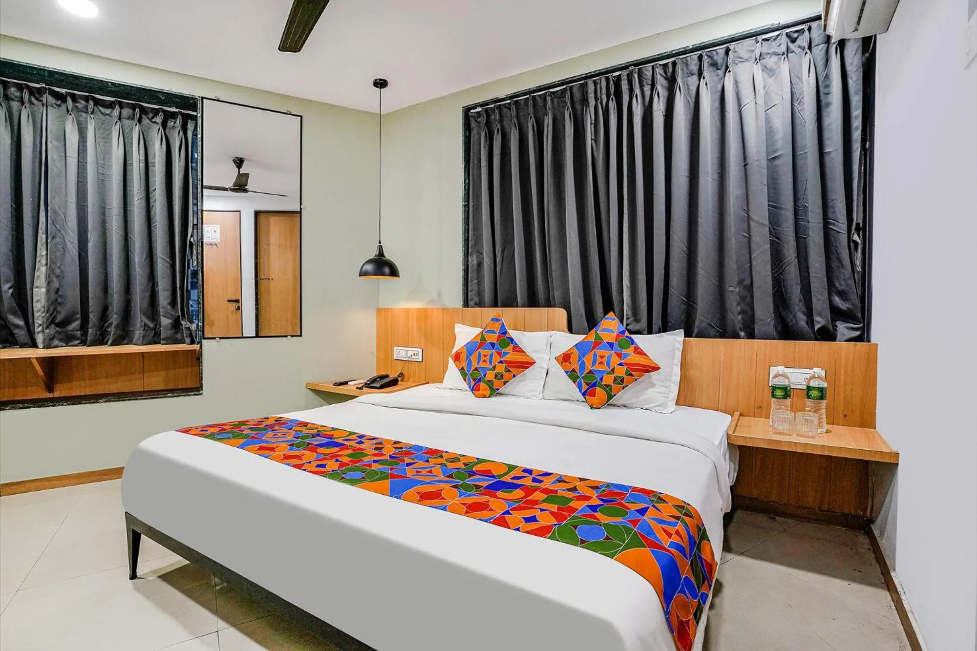 Bedroom in FabHotel Saarthi Inn