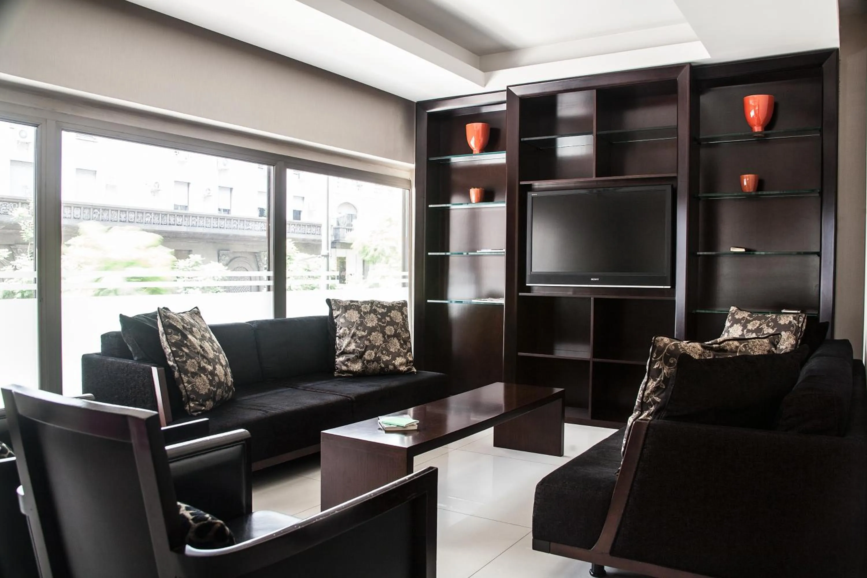 Communal lounge/ TV room in HR Luxor Hotel Buenos Aires