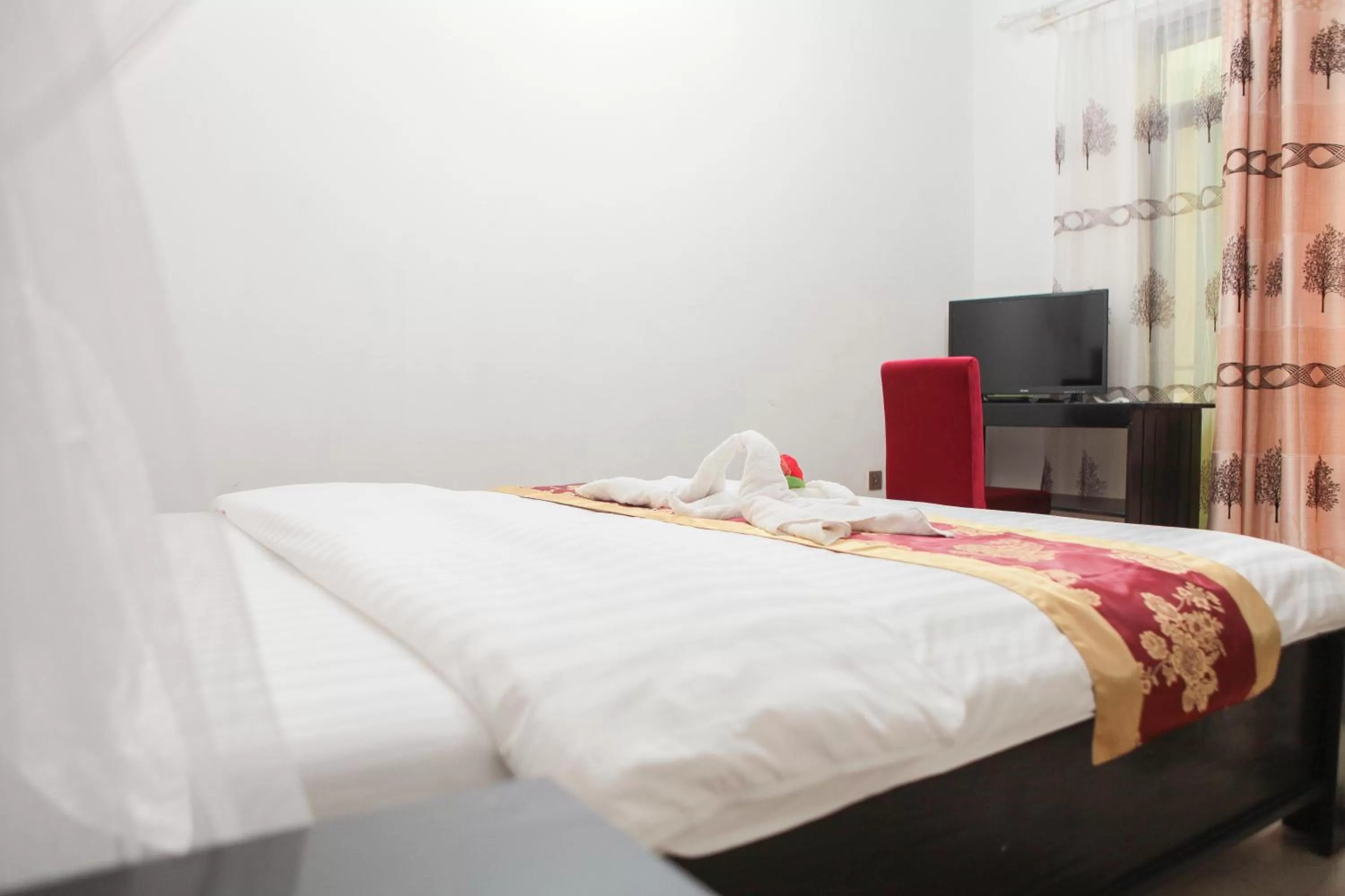 Bed in Hotel Kangaroo Bujumbura