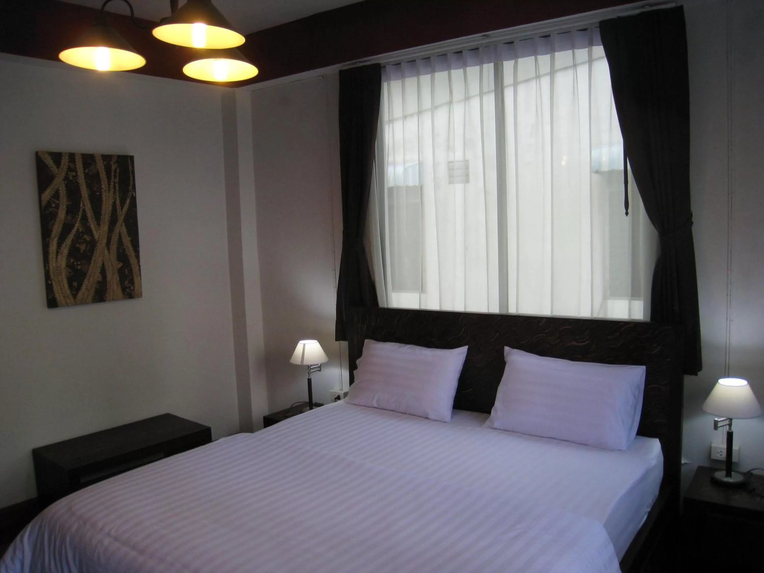 Bed in Baan Glang Soi