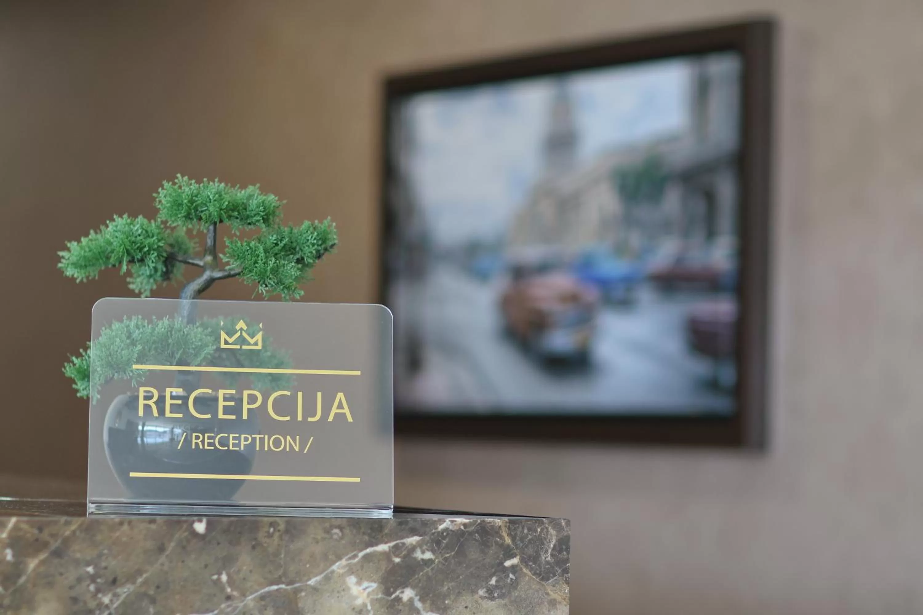 Property logo or sign, TV/Entertainment Center in Royal Residence