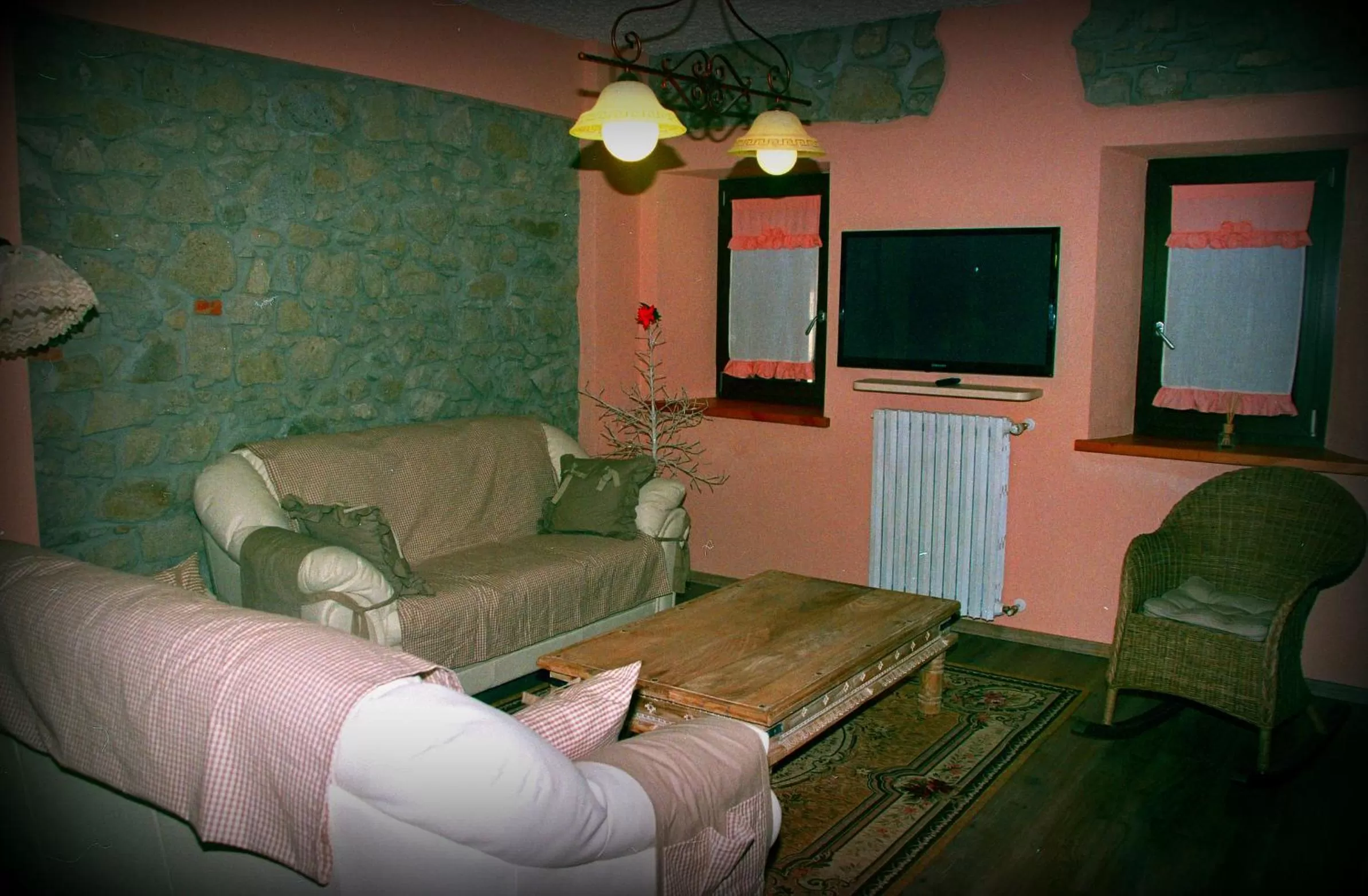 Communal lounge/ TV room in Locanda del Viandante