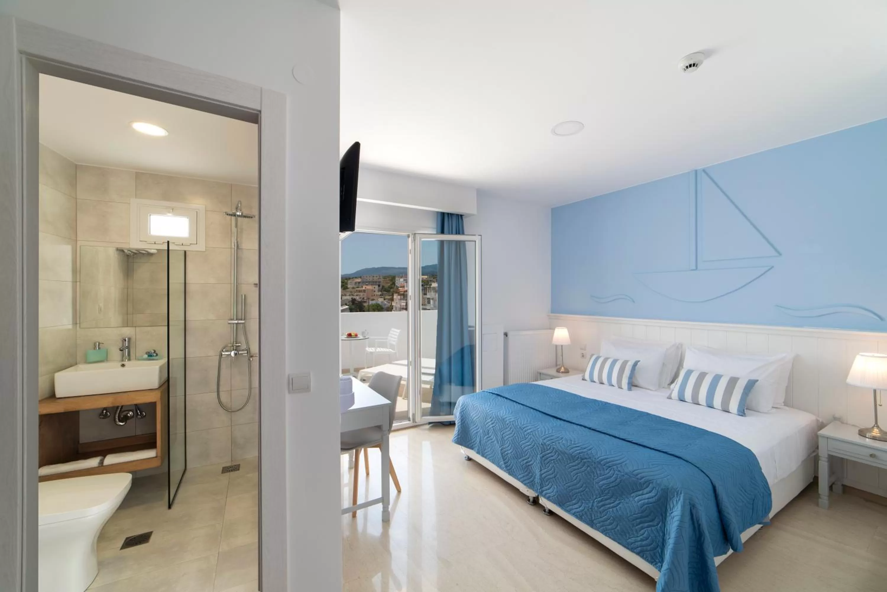 Bed in Naiades Marina Hotel