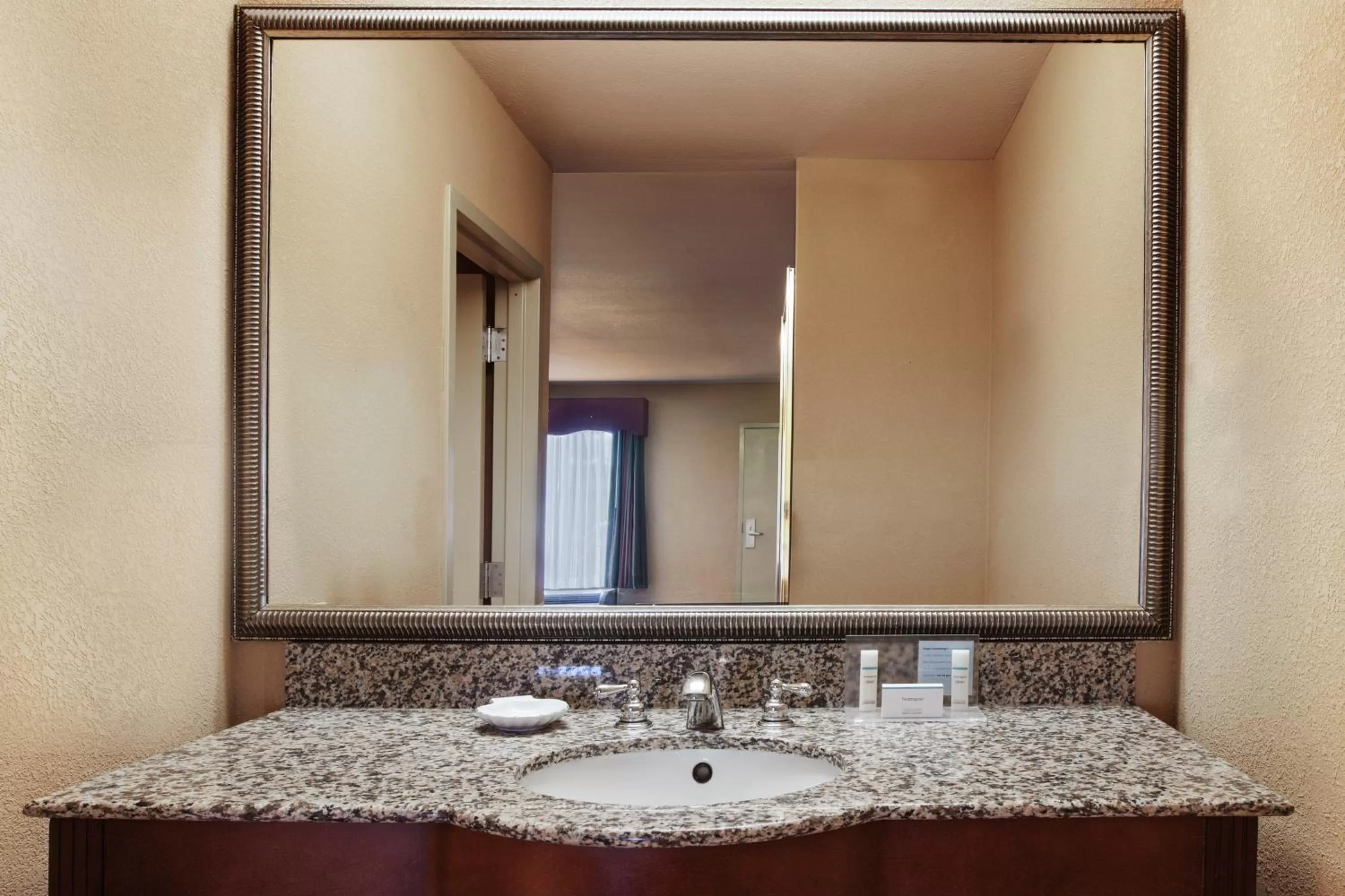 Bathroom in Days Inn & Suites by Wyndham Tyler