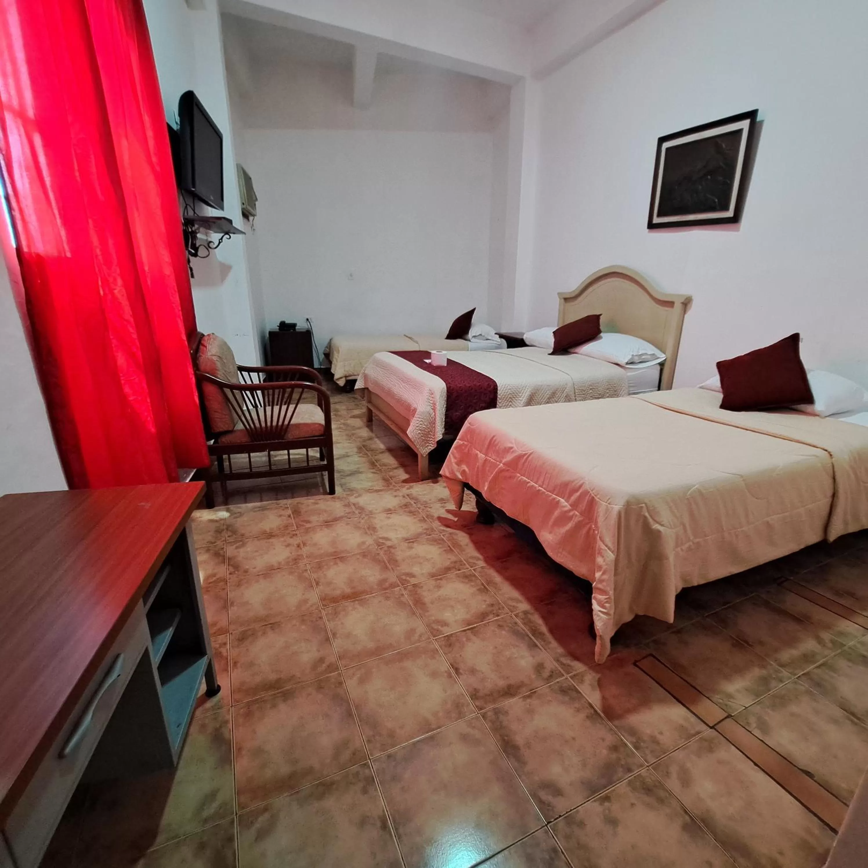 Photo of the whole room, Bed in Atlantic Suites Hotel