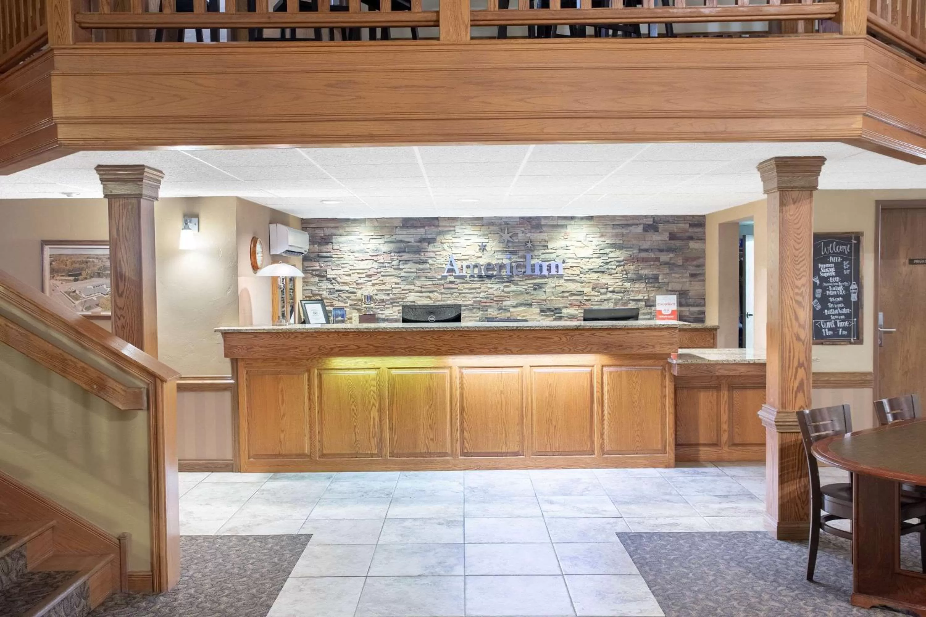 Lobby or reception in AmericInn by Wyndham Green Bay West