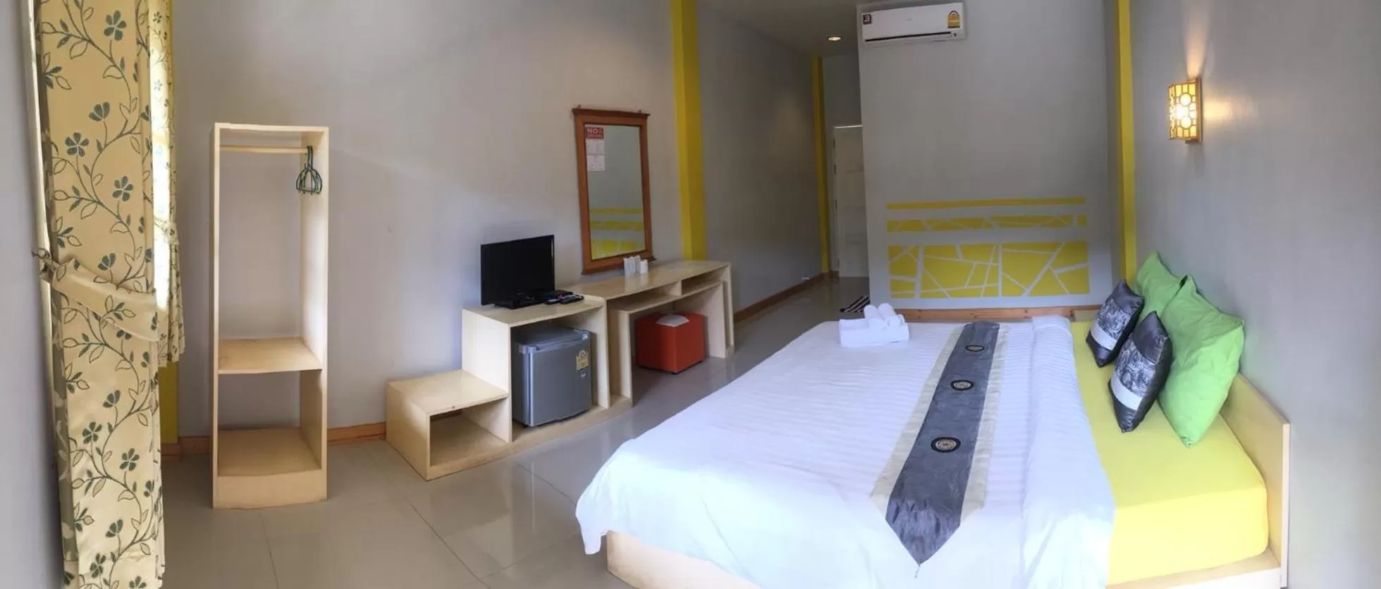 Bed in Bamboo House Resort