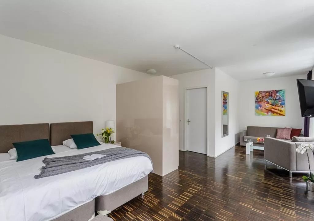 Photo of the whole room, Bed in Swiss Star Home