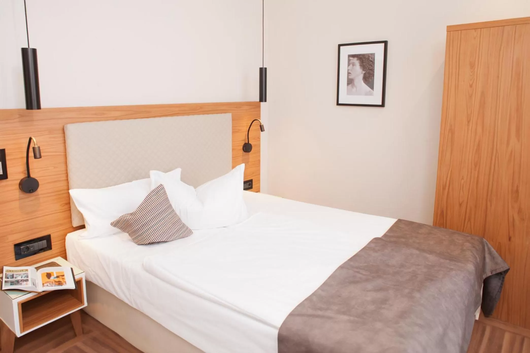 Bed in Hotel Schweriner Hof