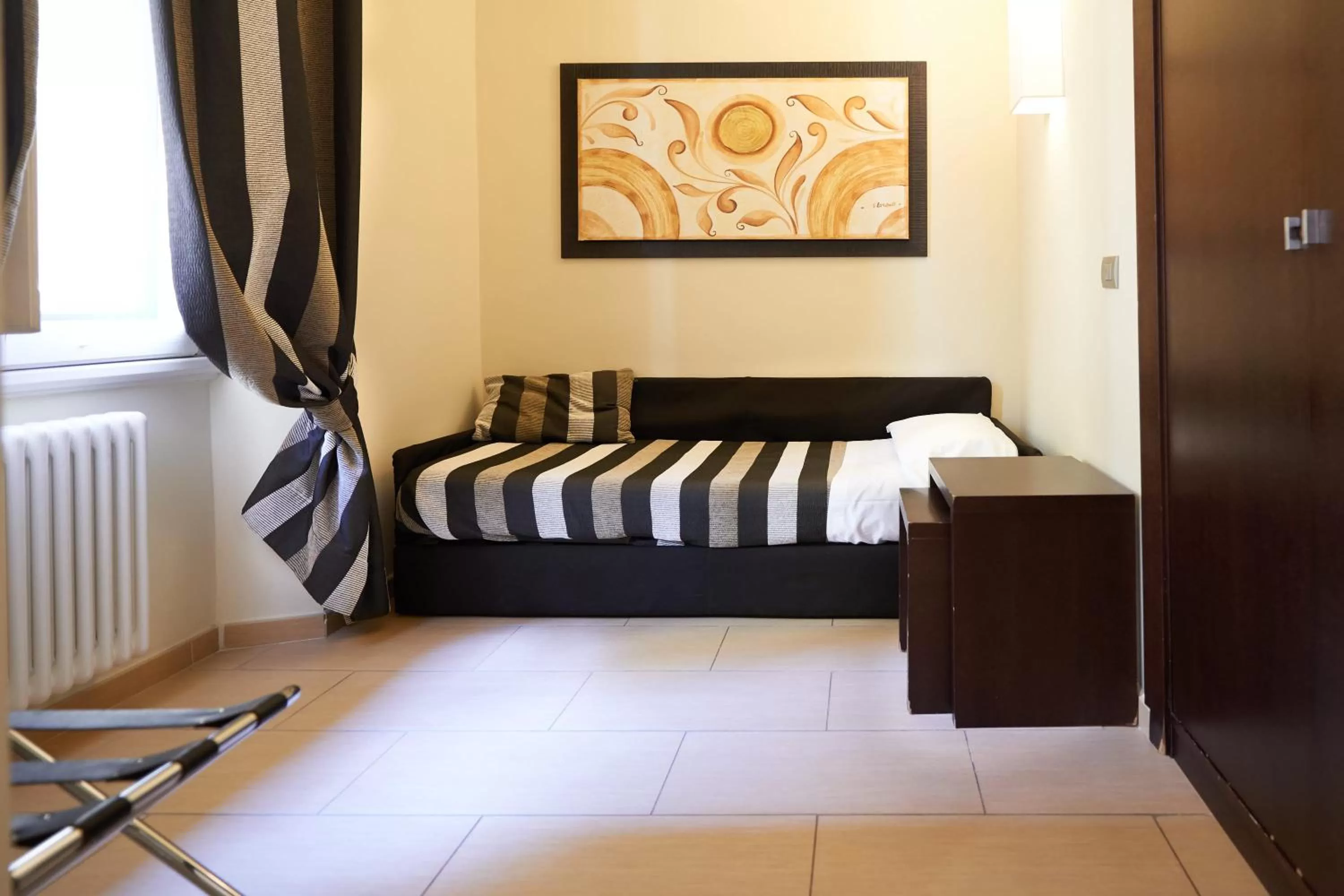 Bed in Hotel Cosimo de' Medici