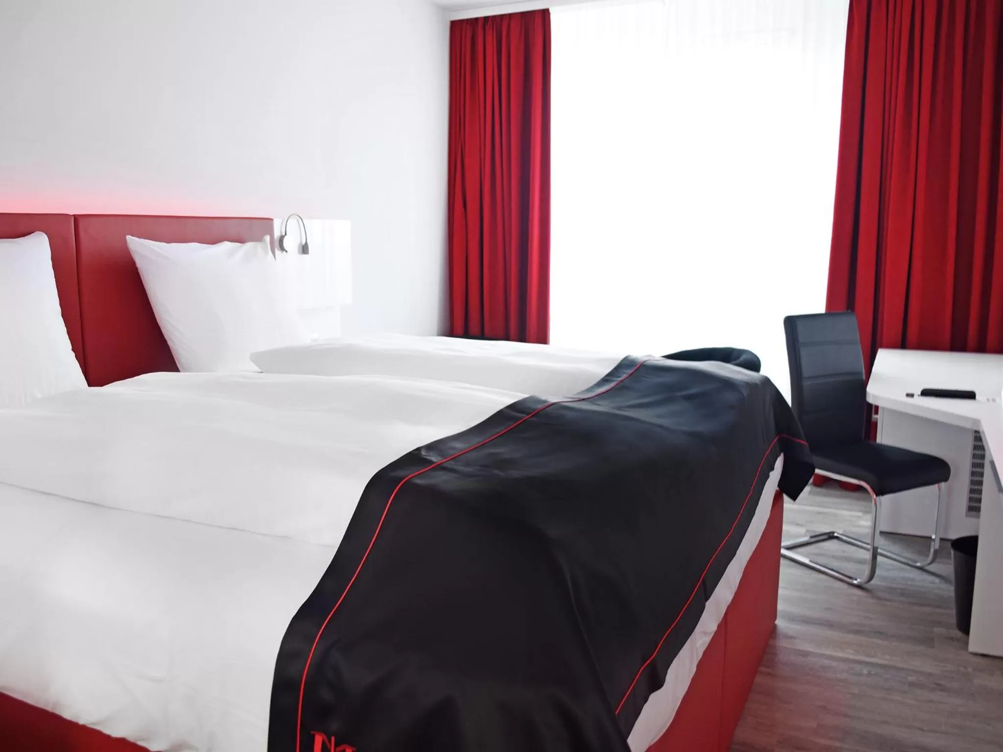 Photo of the whole room, Bed in DORMERO Hotel Darmstadt