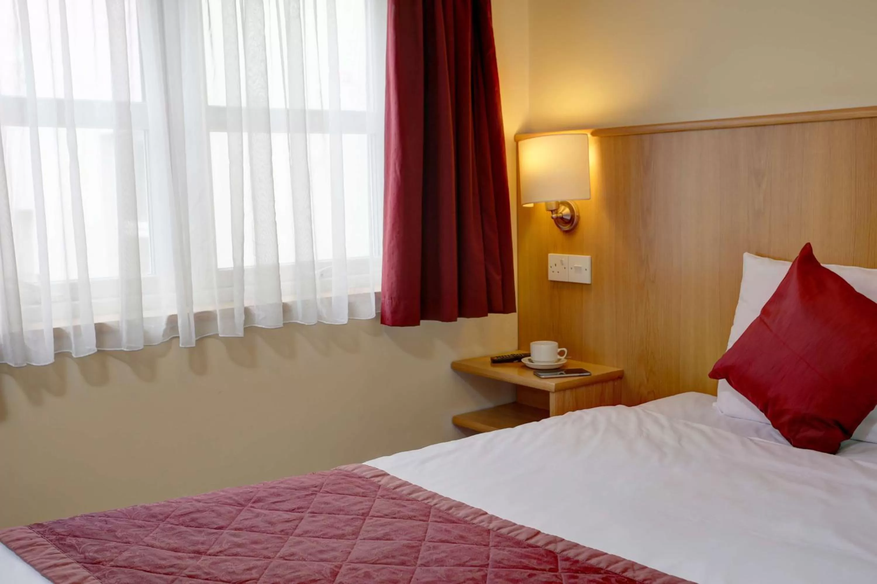 Photo of the whole room, Bed in Best Western London Highbury