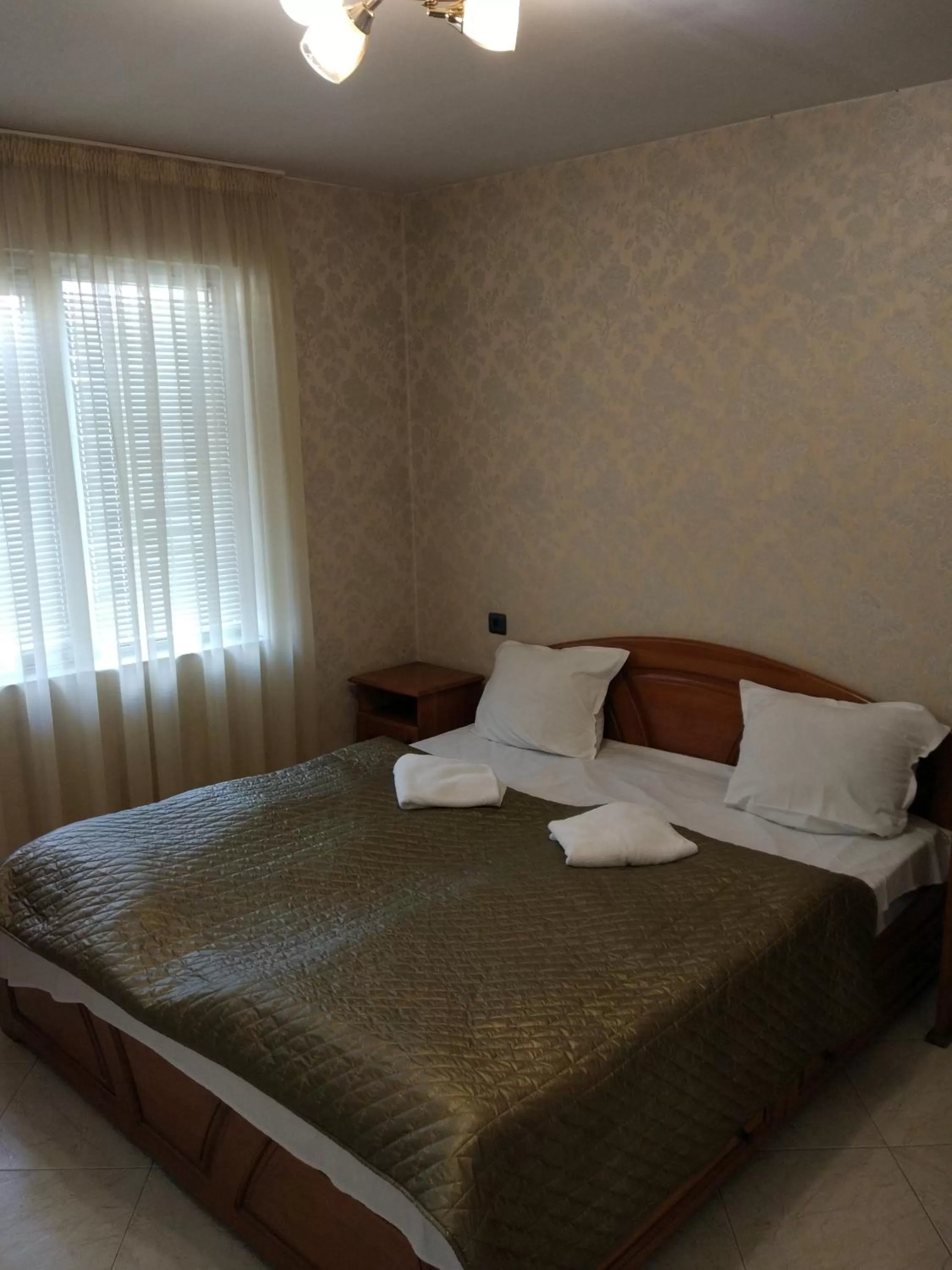 Photo of the whole room, Bed in Family Hotel Kartala