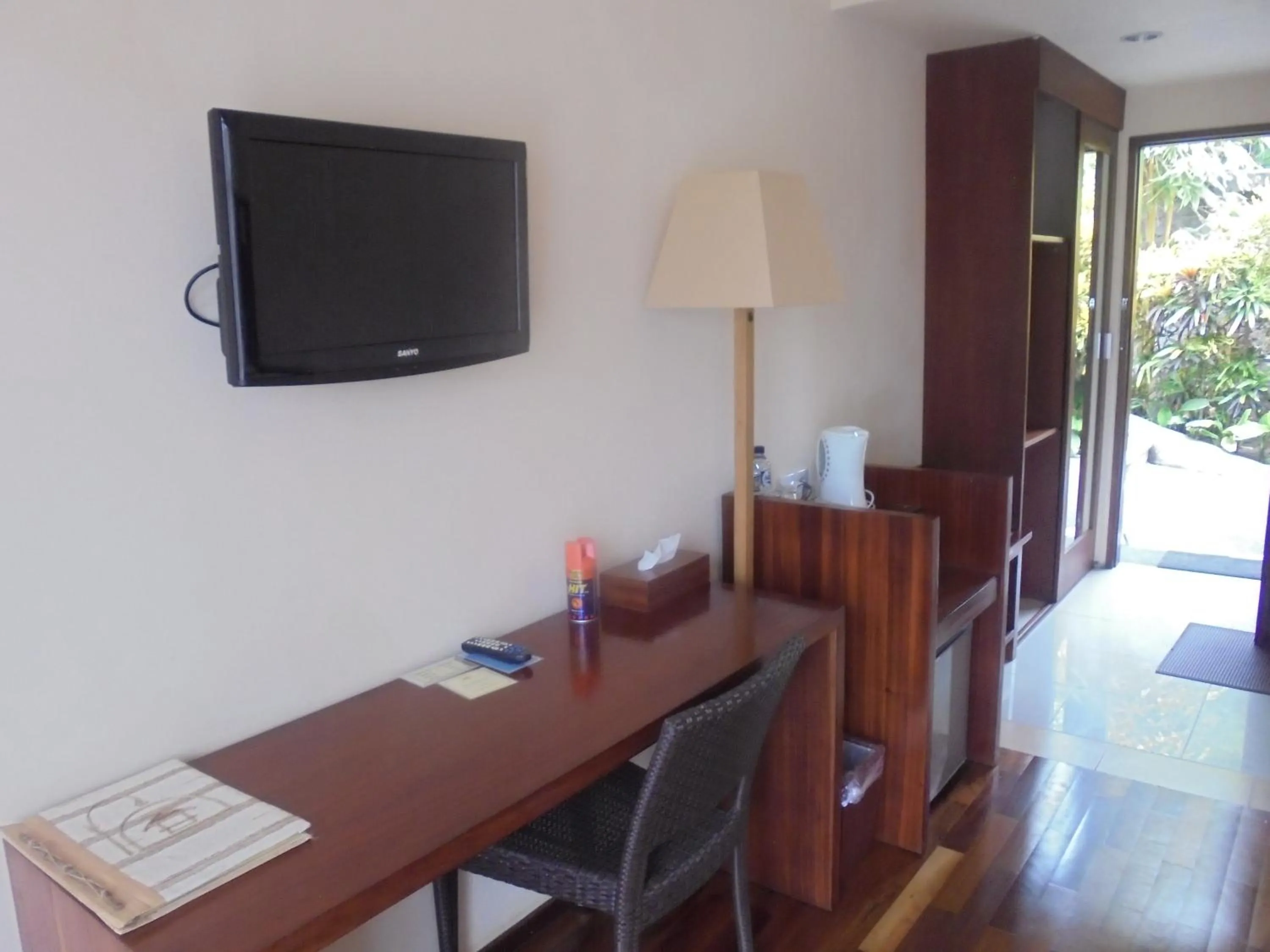 TV and multimedia in Biyukukung Suite & Spa