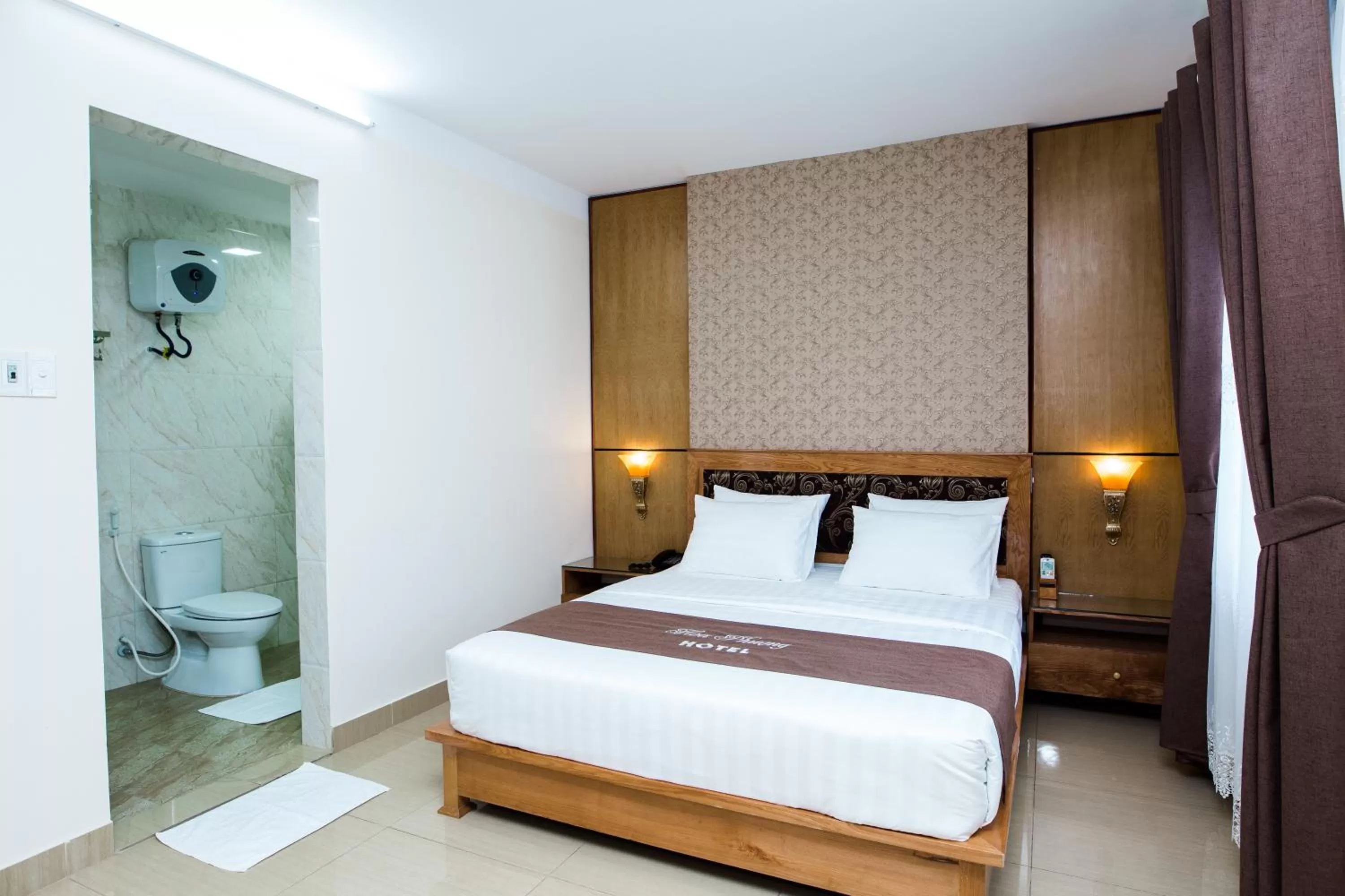 Bed in Hoa Phuong Hotel